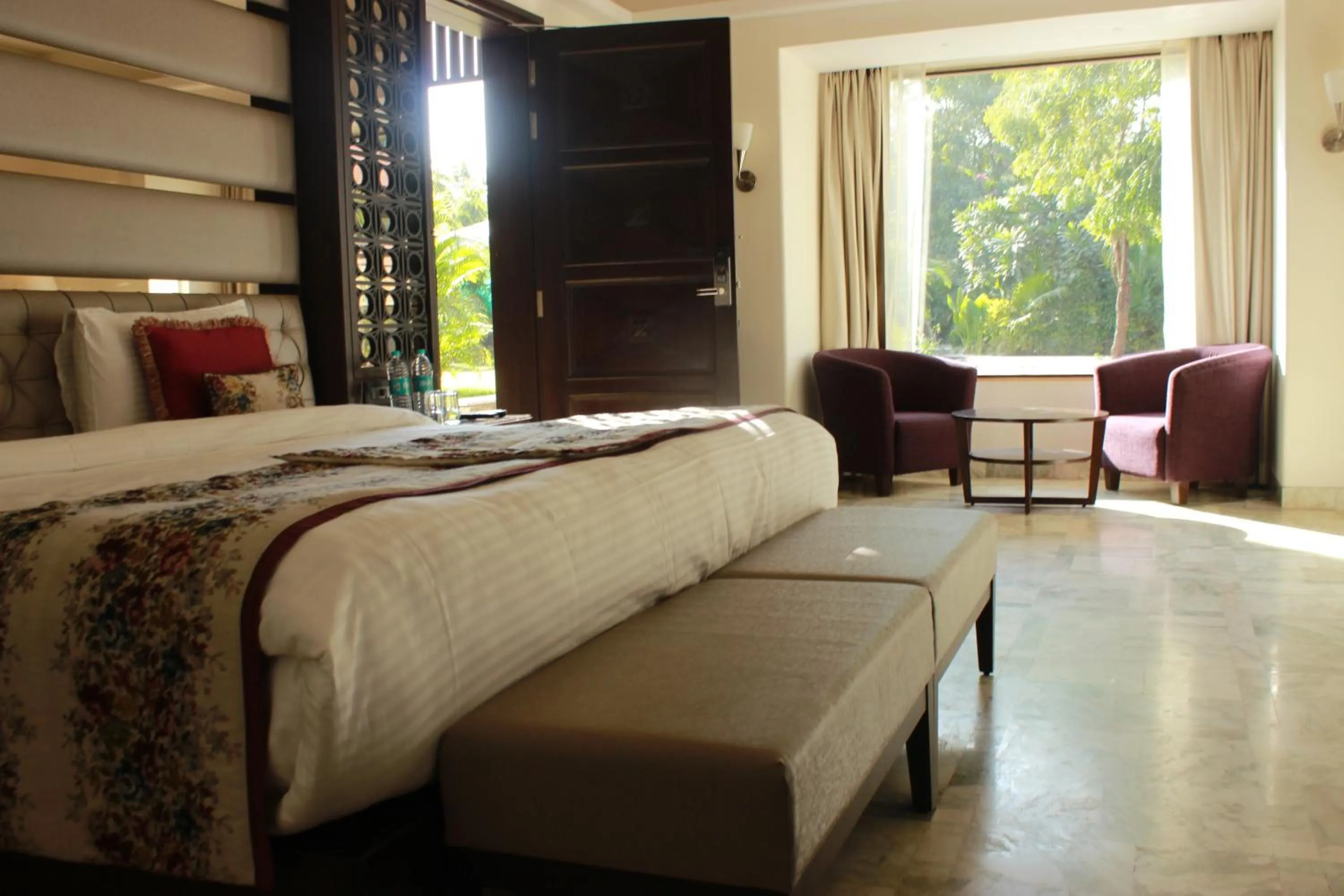 Bed in Ramya Resort & Spa