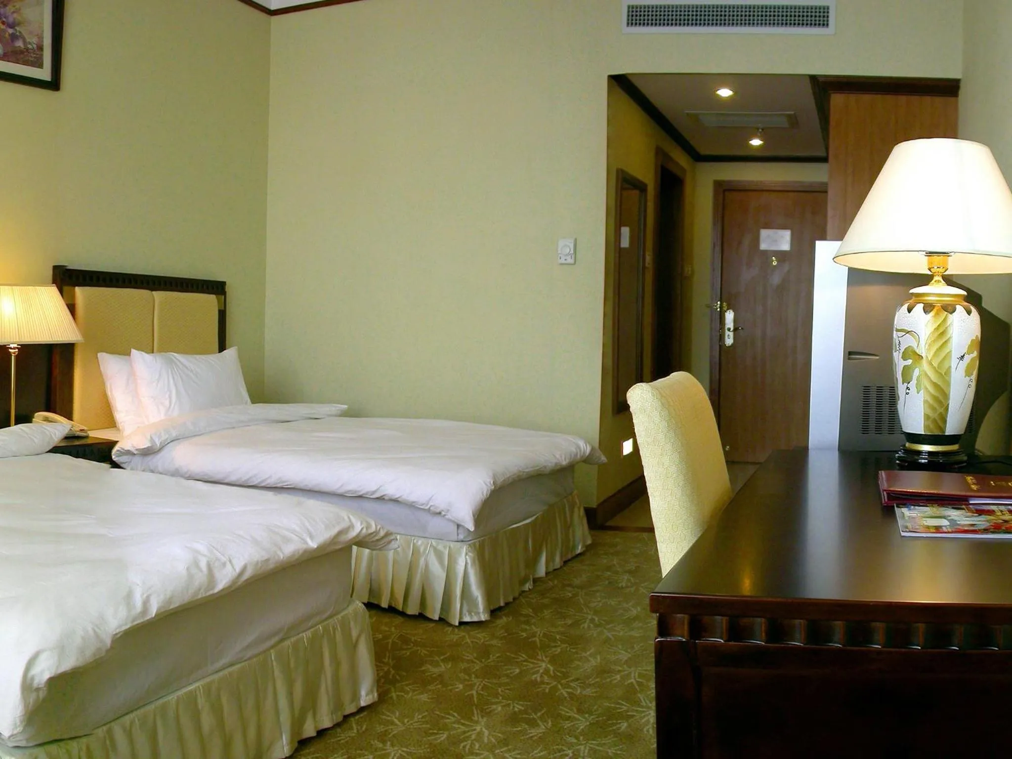 Photo of the whole room, Bed in Don Chan Palace Hotel & Convention