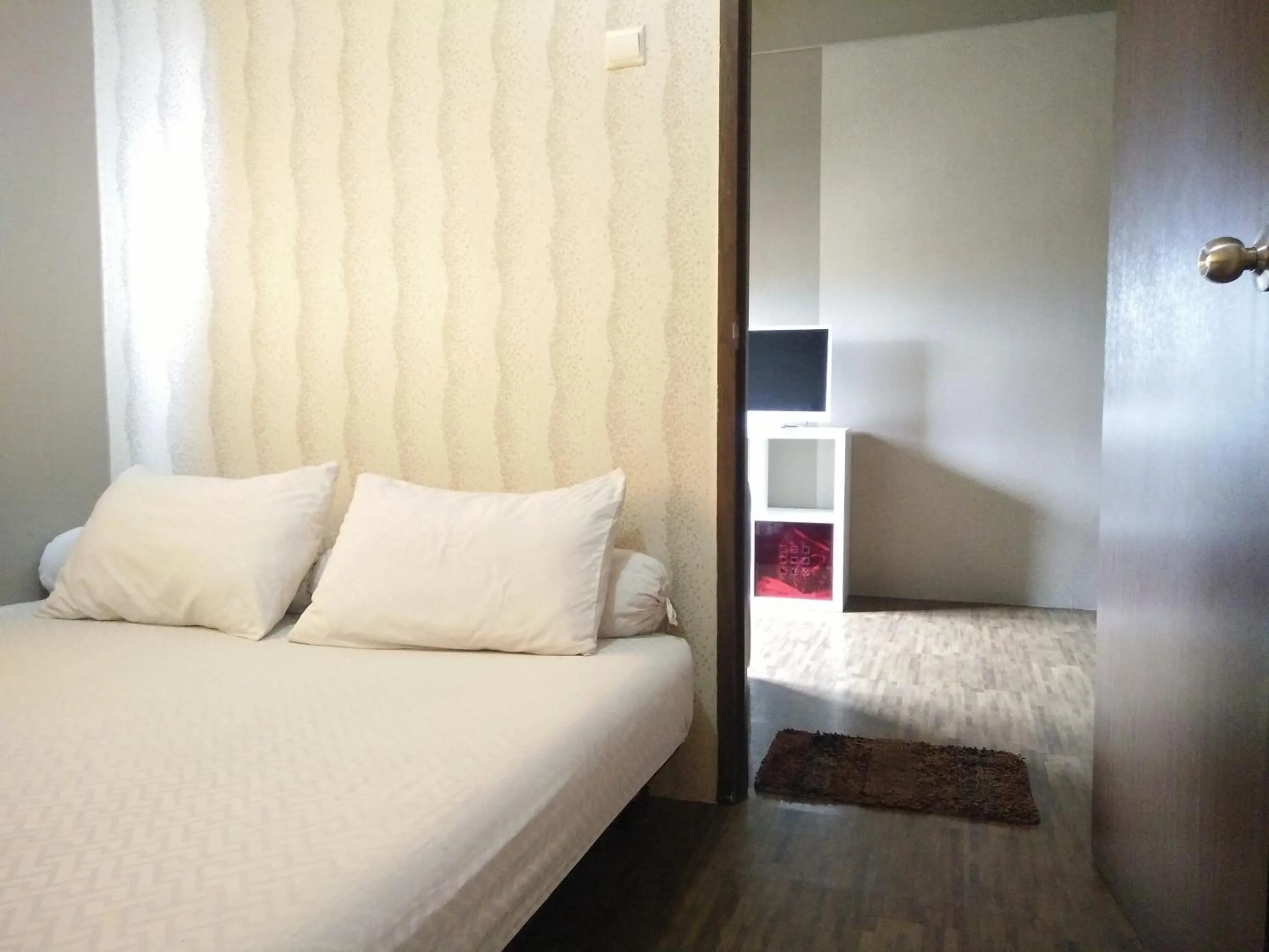 Bed in Apartment The Suites Metro by Yudis