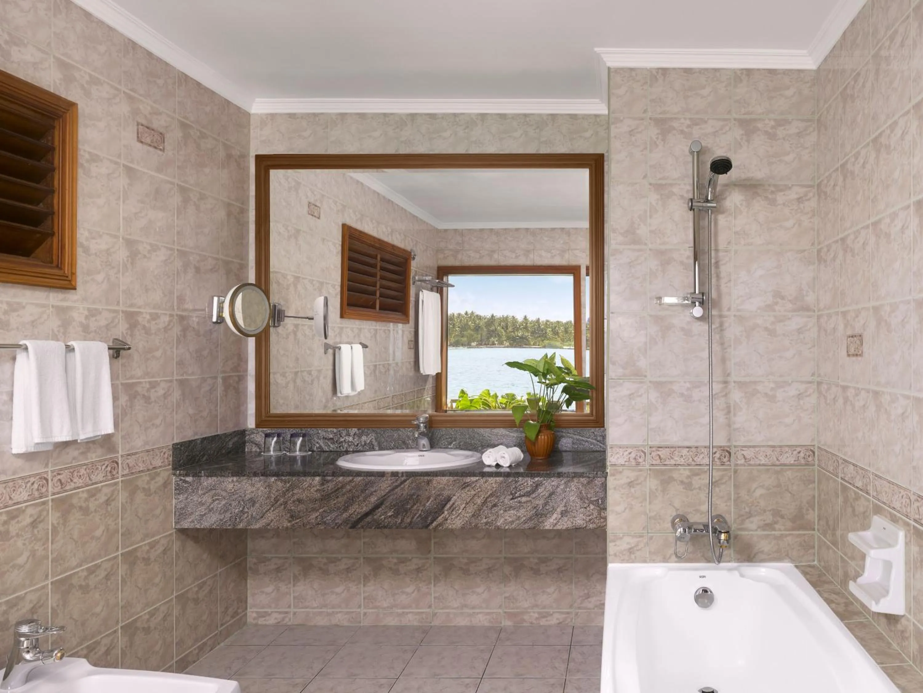 Bathroom in Villa Park Sun Island Resort