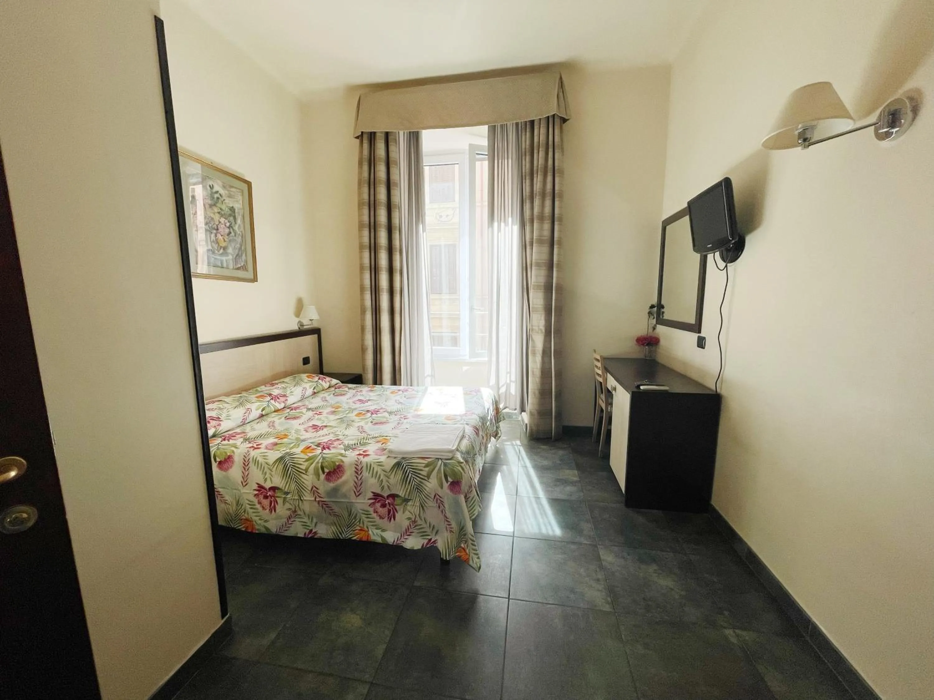 Photo of the whole room, Bed in Clarian Affittacamere