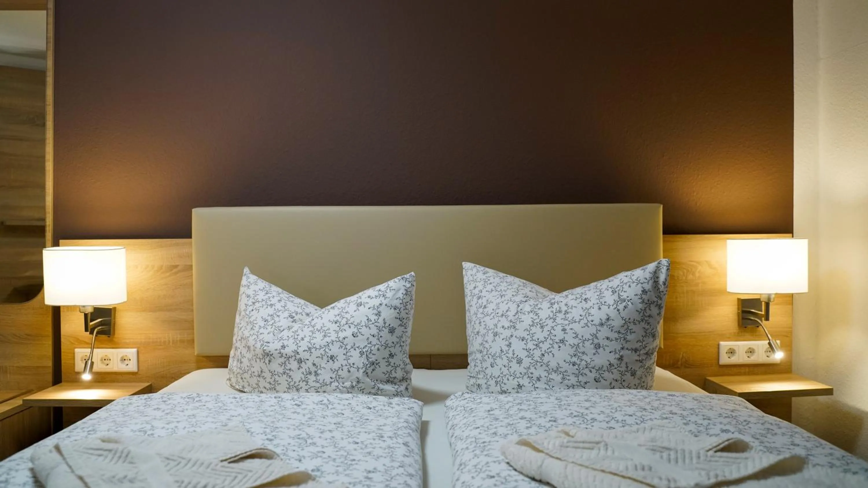 Bed in Hotel Maximilian