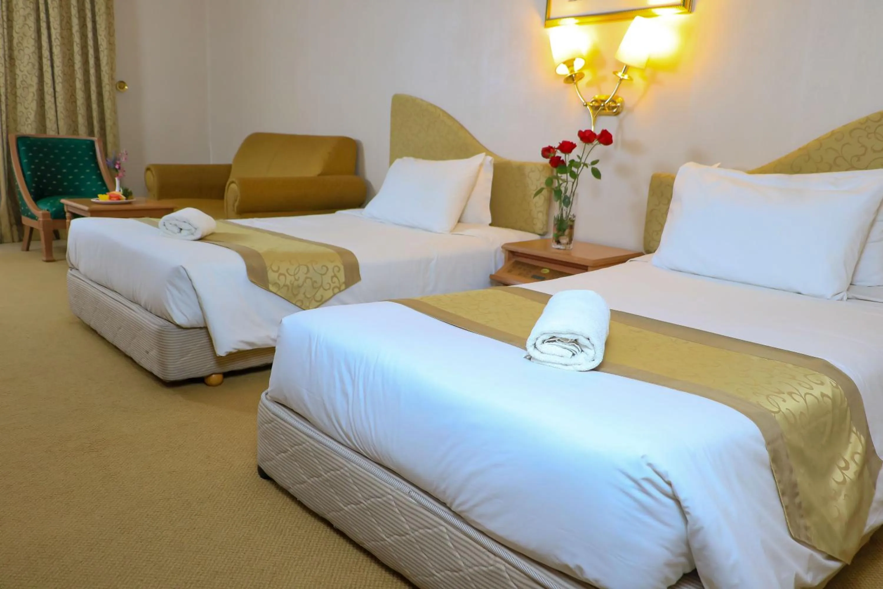 Bed in Merdeka Palace Hotel & Suites