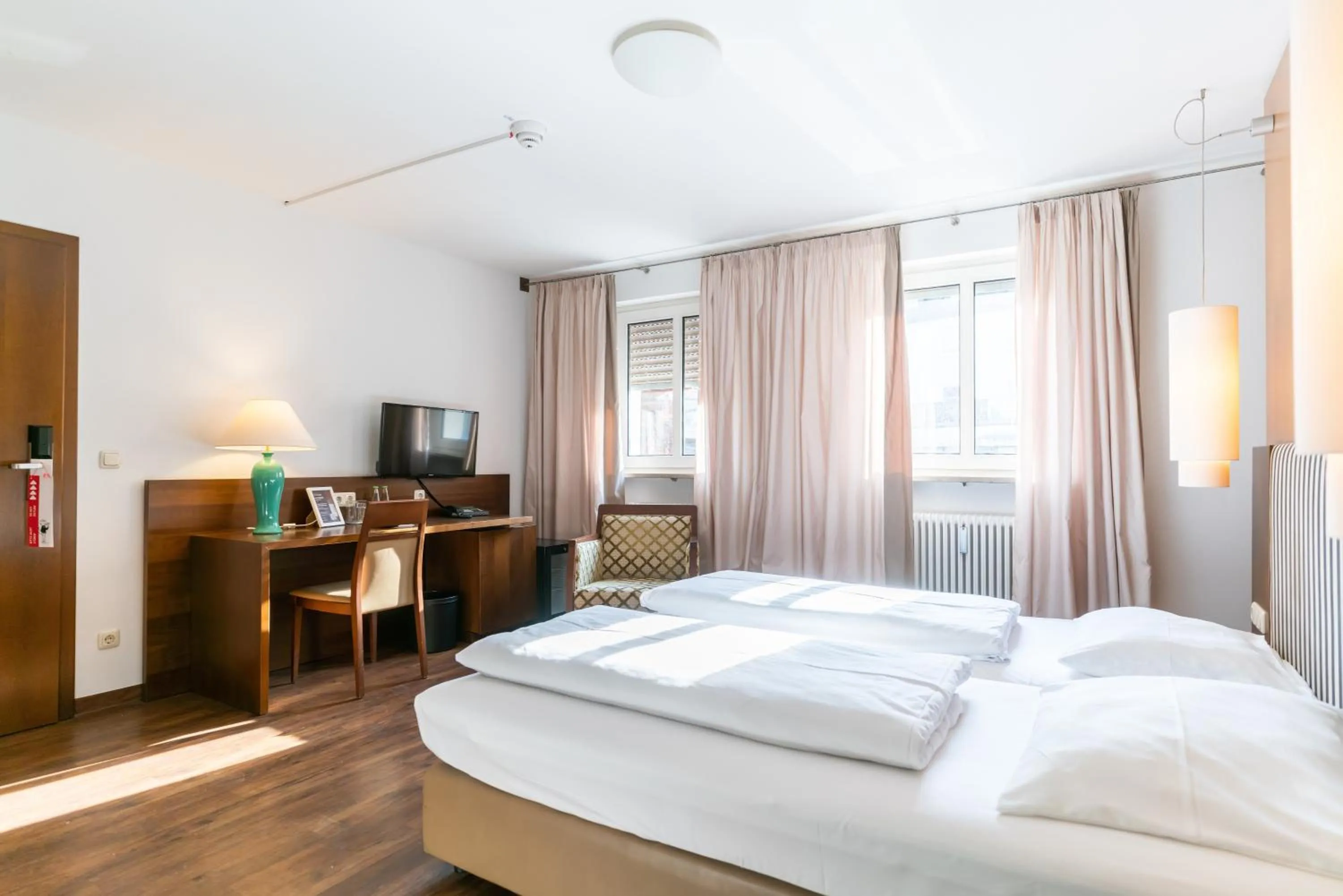 Bed in Altstadthotel Grauer Wolf