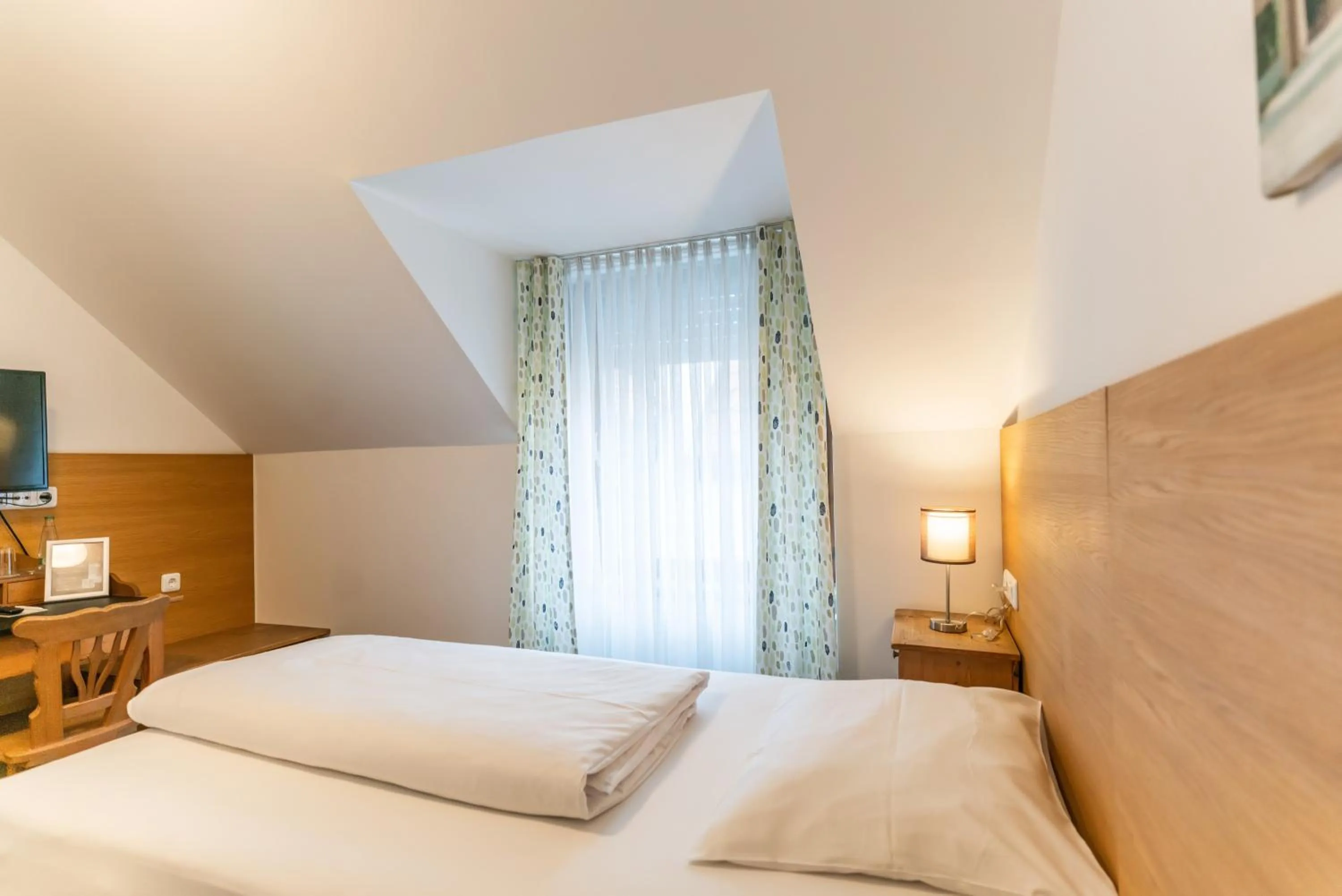 Bed in Altstadthotel Grauer Wolf