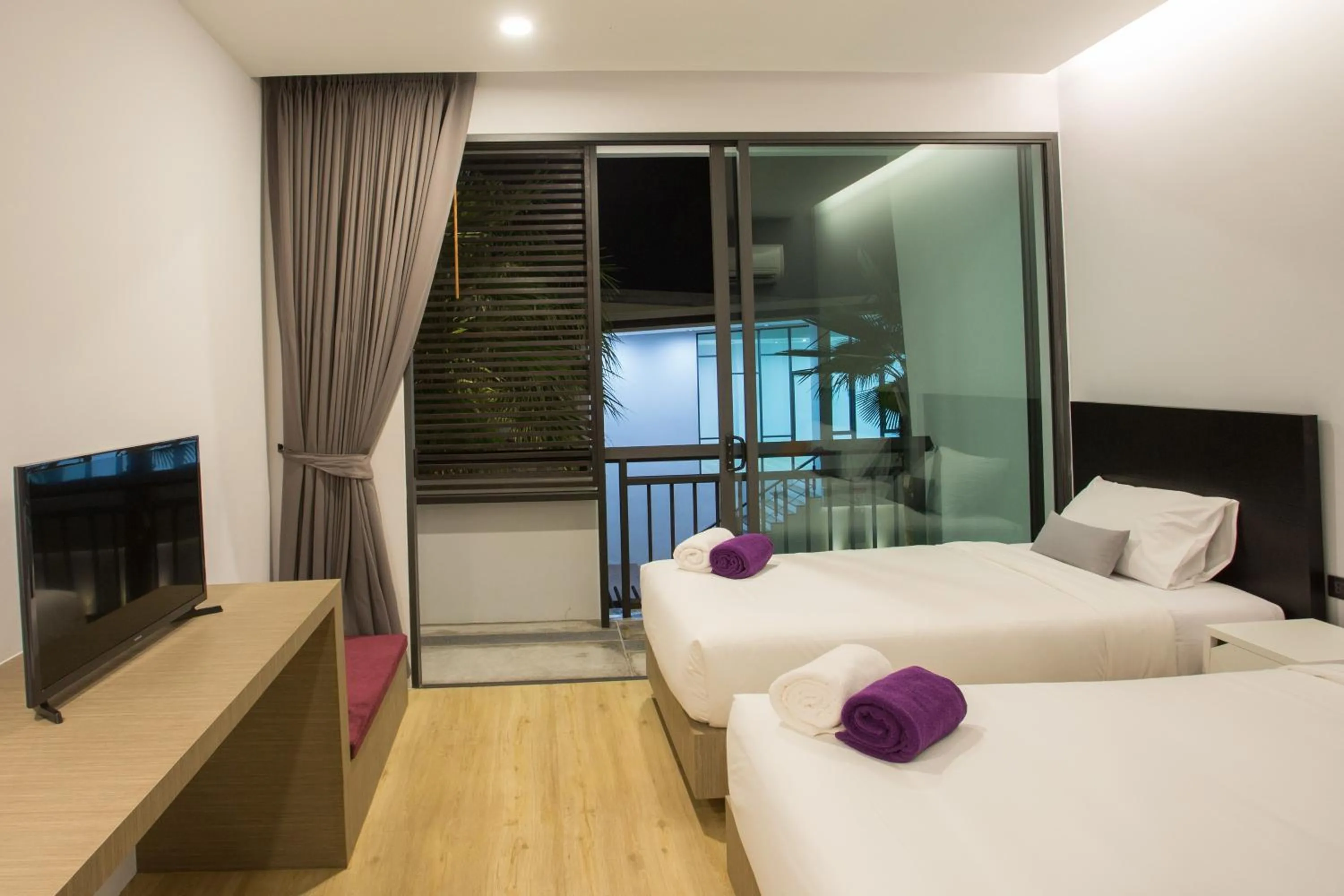 Bed in Chaweng Villawee Hotel