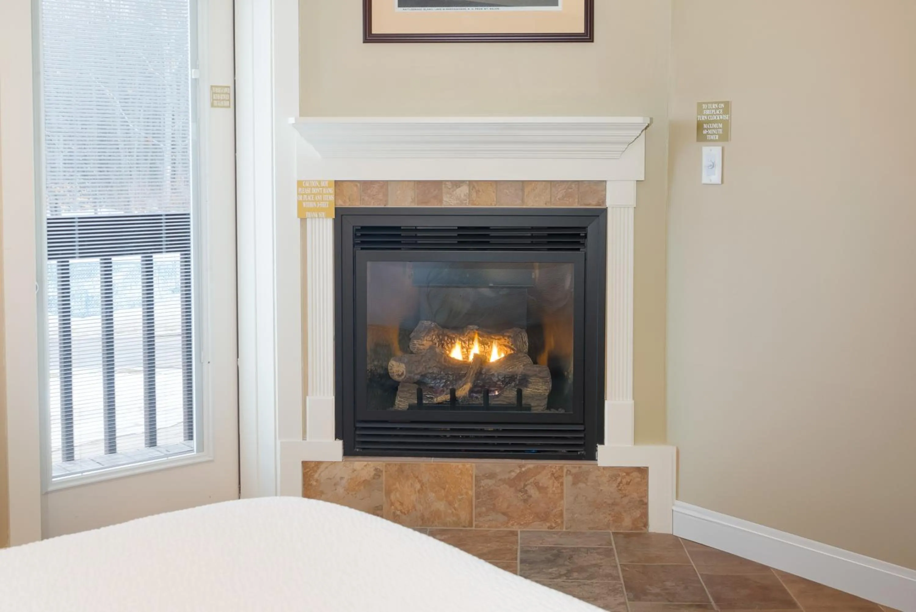 fireplace in Fireside Inn & Suites Gilford
