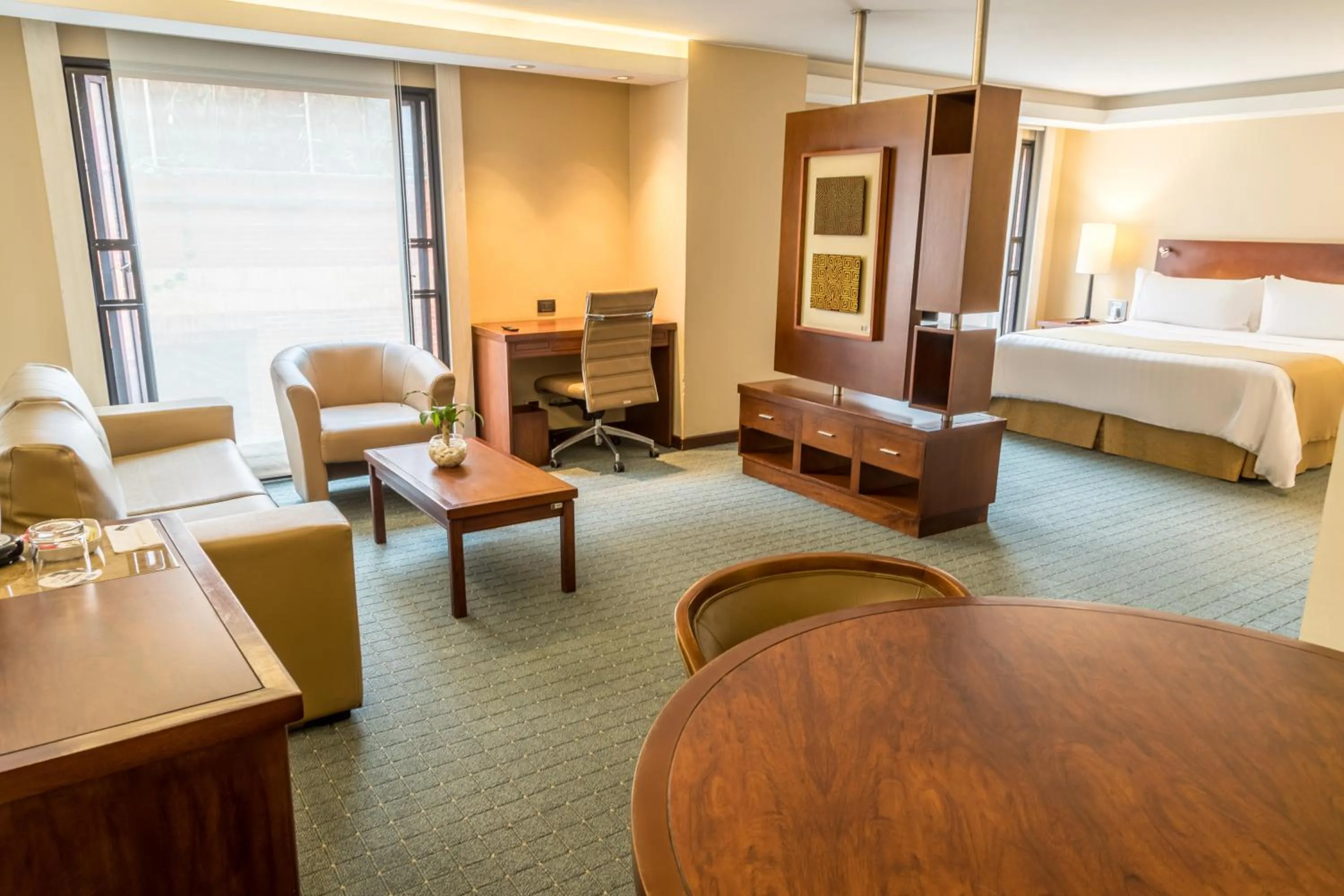 Living room, Bed in GHL Hotel Capital