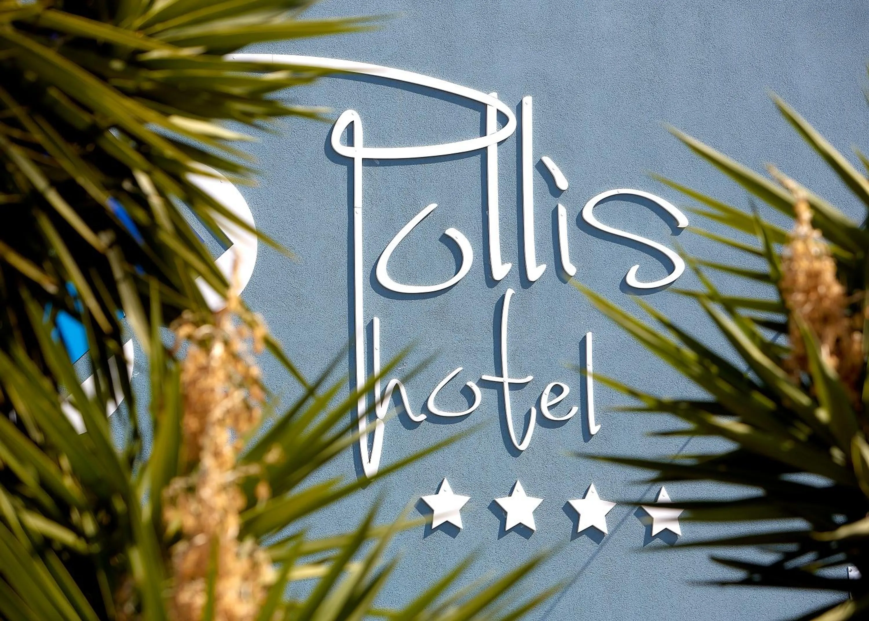 Property logo or sign in Pollis Hotel