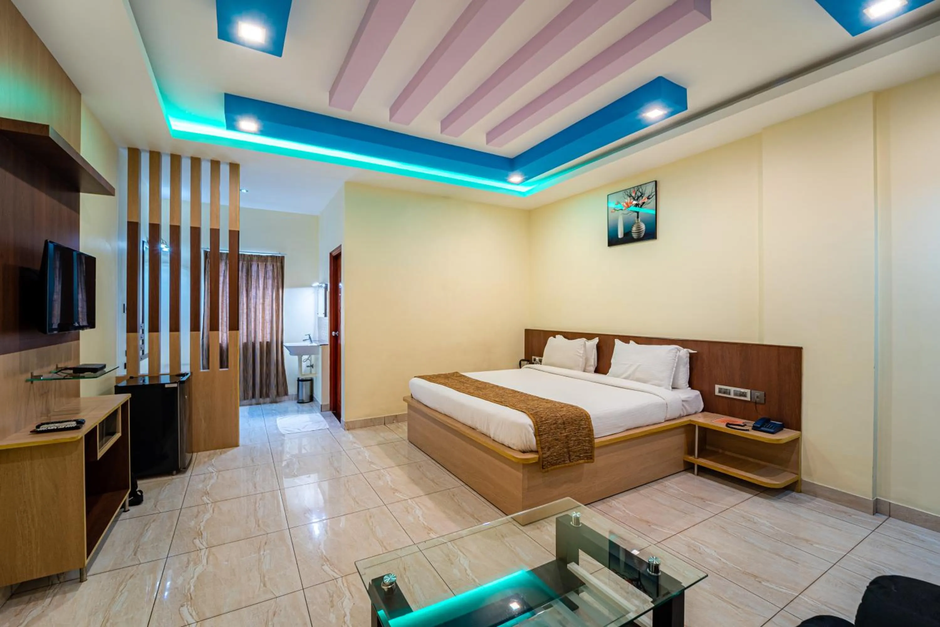 Photo of the whole room, Bed in Thaneegai Residency