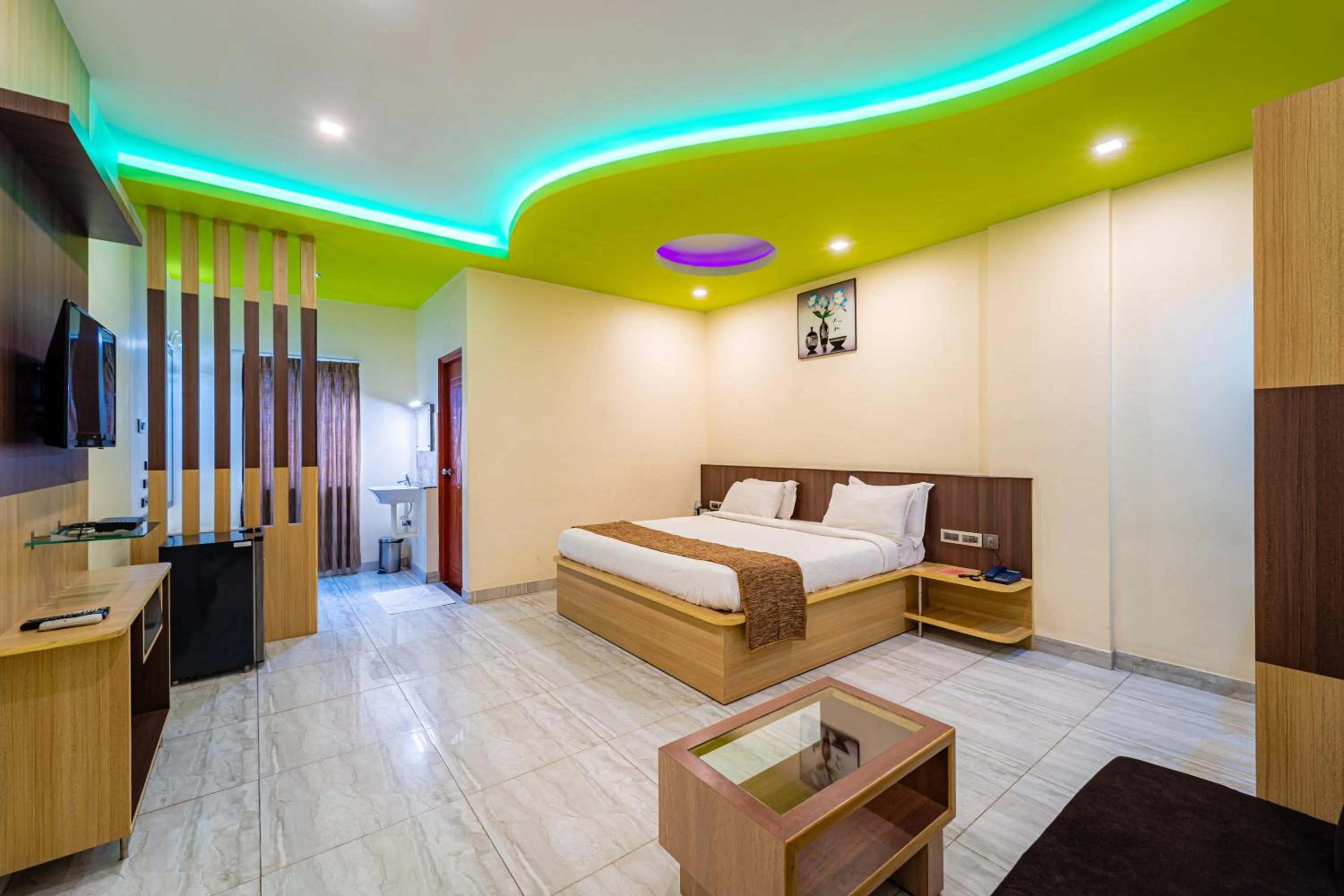 Photo of the whole room, Bed in Thaneegai Residency