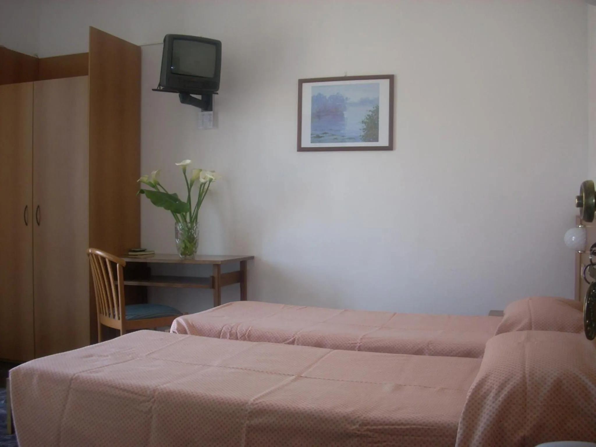 Bed in Hotel Corallo