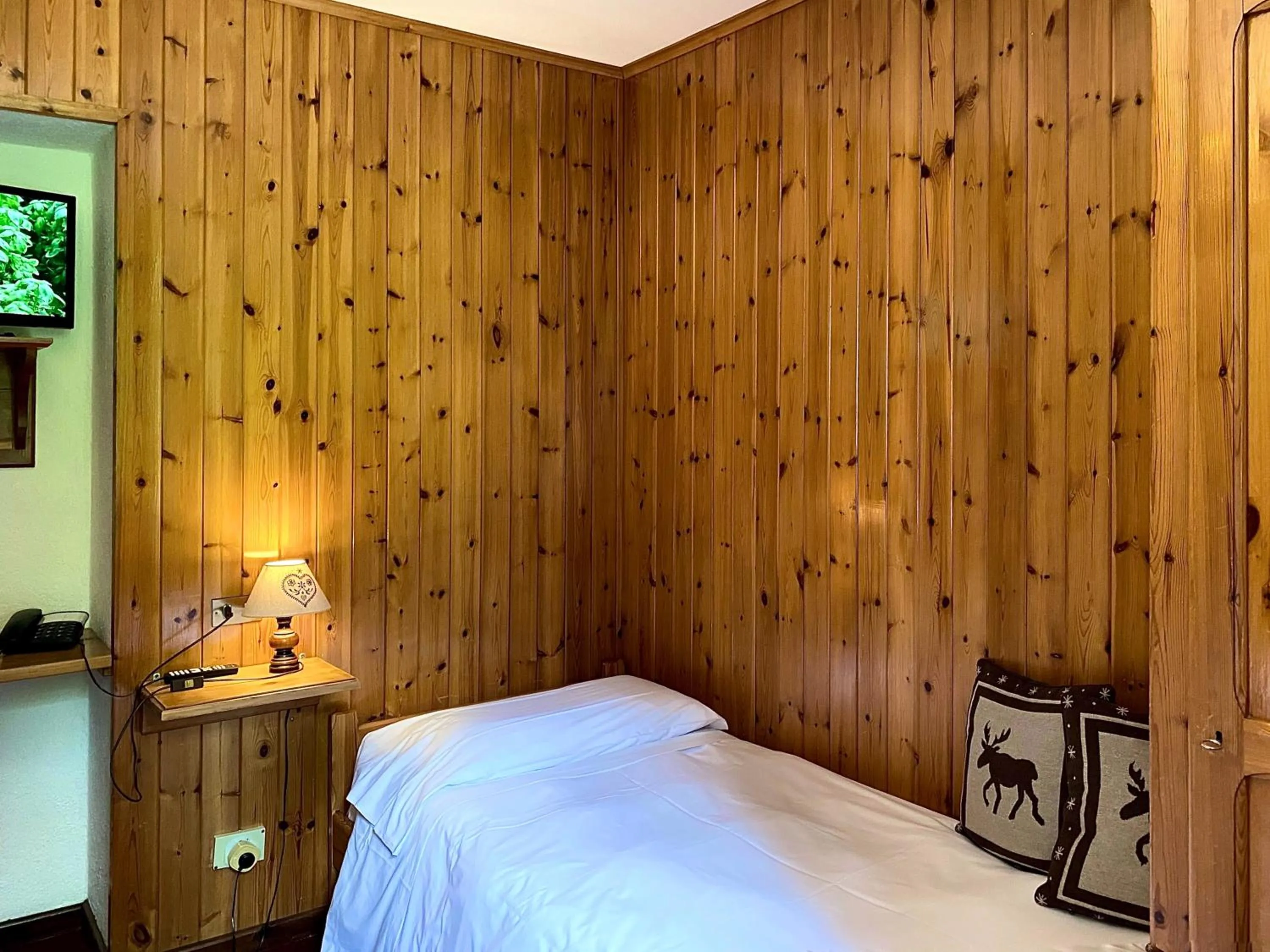 Bedroom in Hotel Dei Camosci