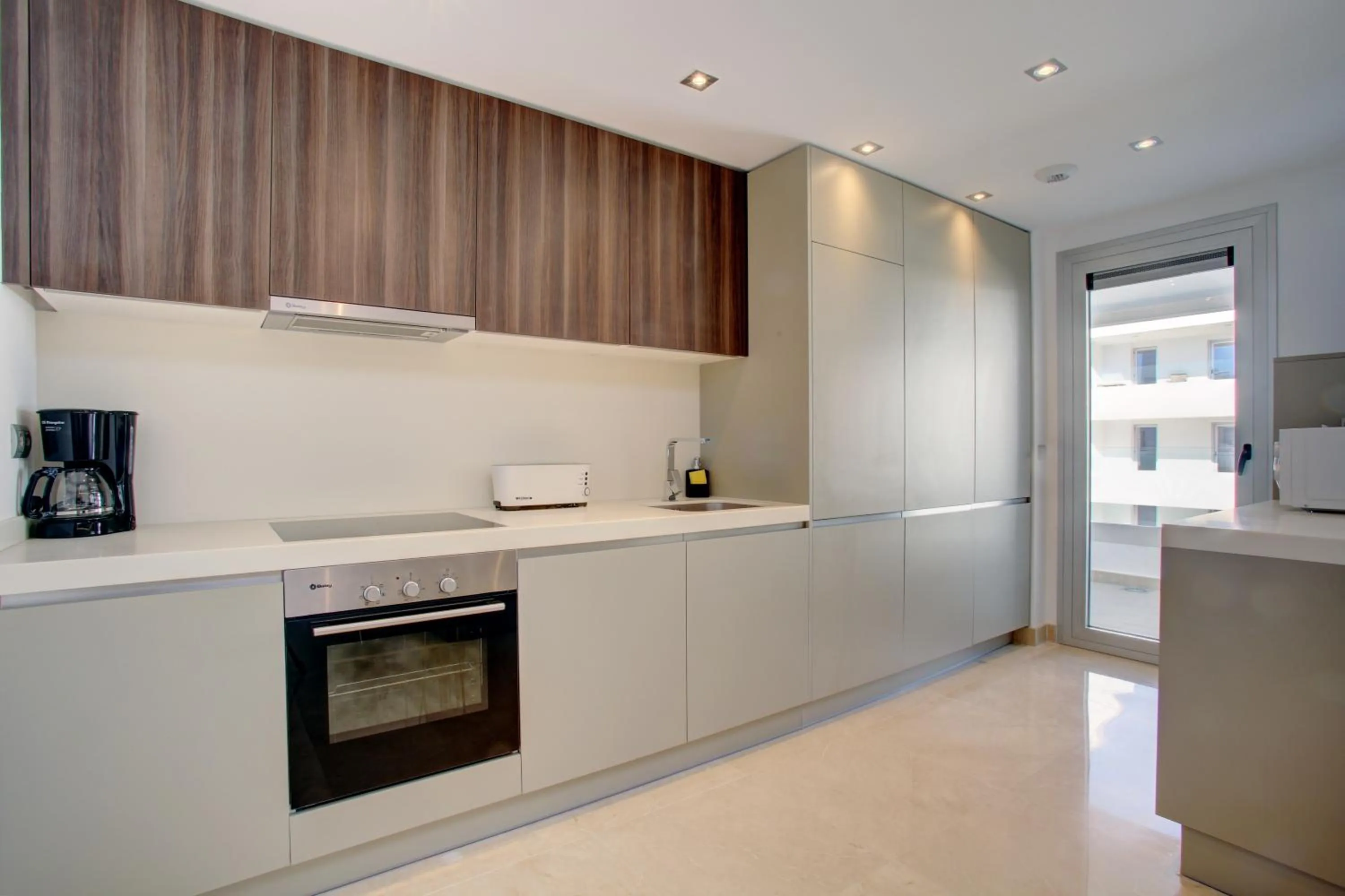 Kitchen or kitchenette in Aqua Apartments Vento, Marbella