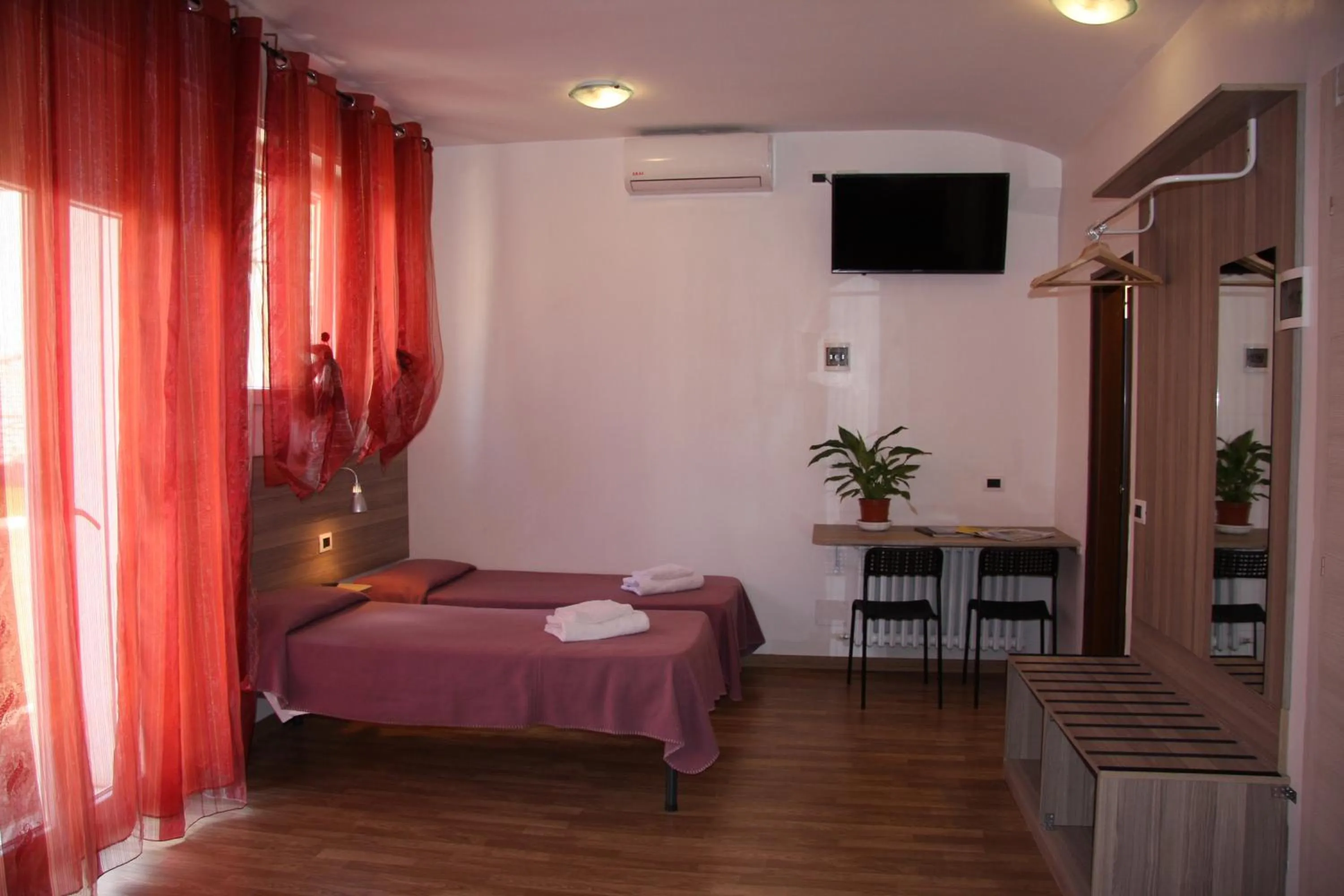 Bed in Hotel Adelchi