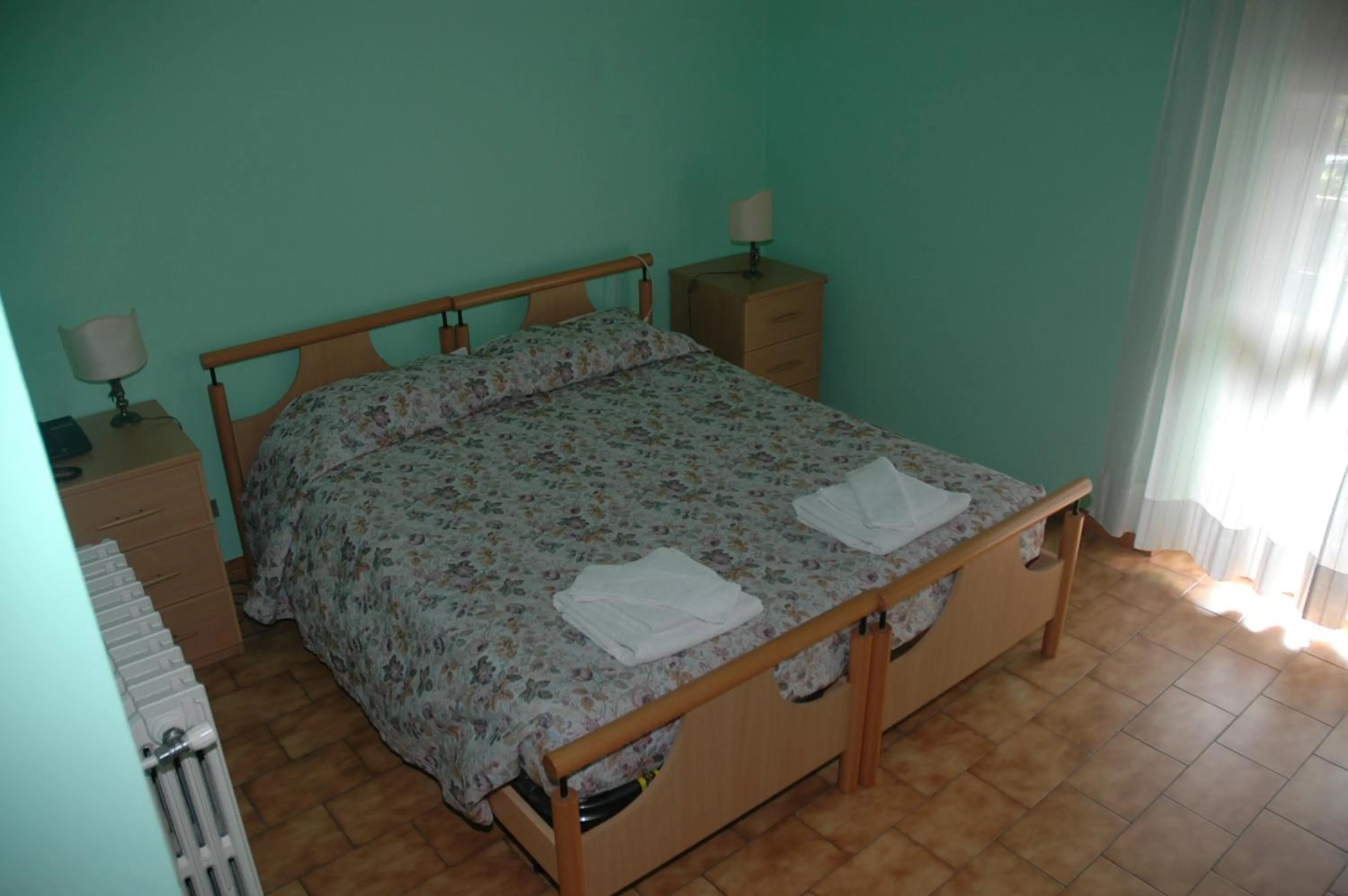 Bed in Hotel Valentino