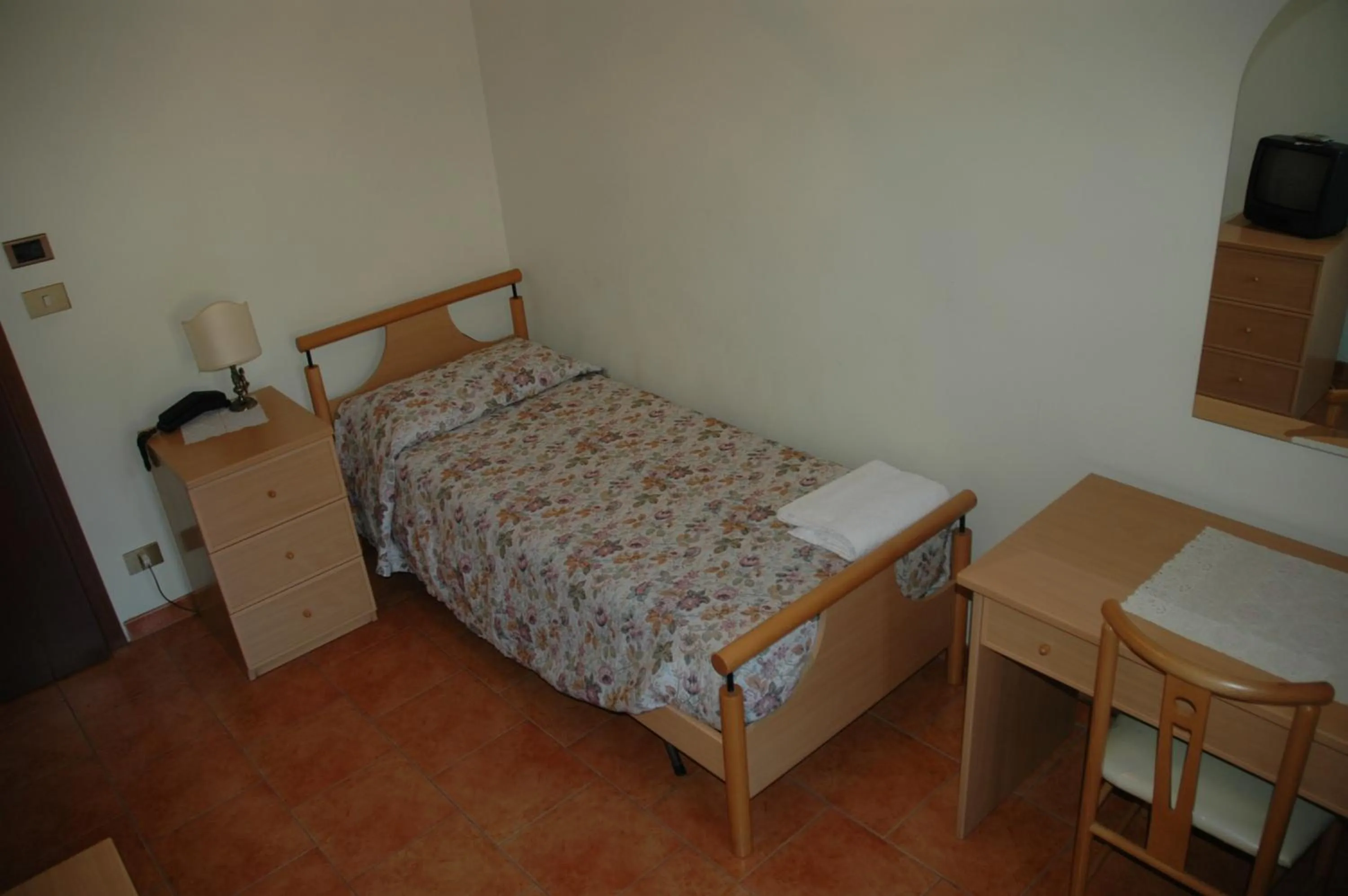 Bed in Hotel Valentino