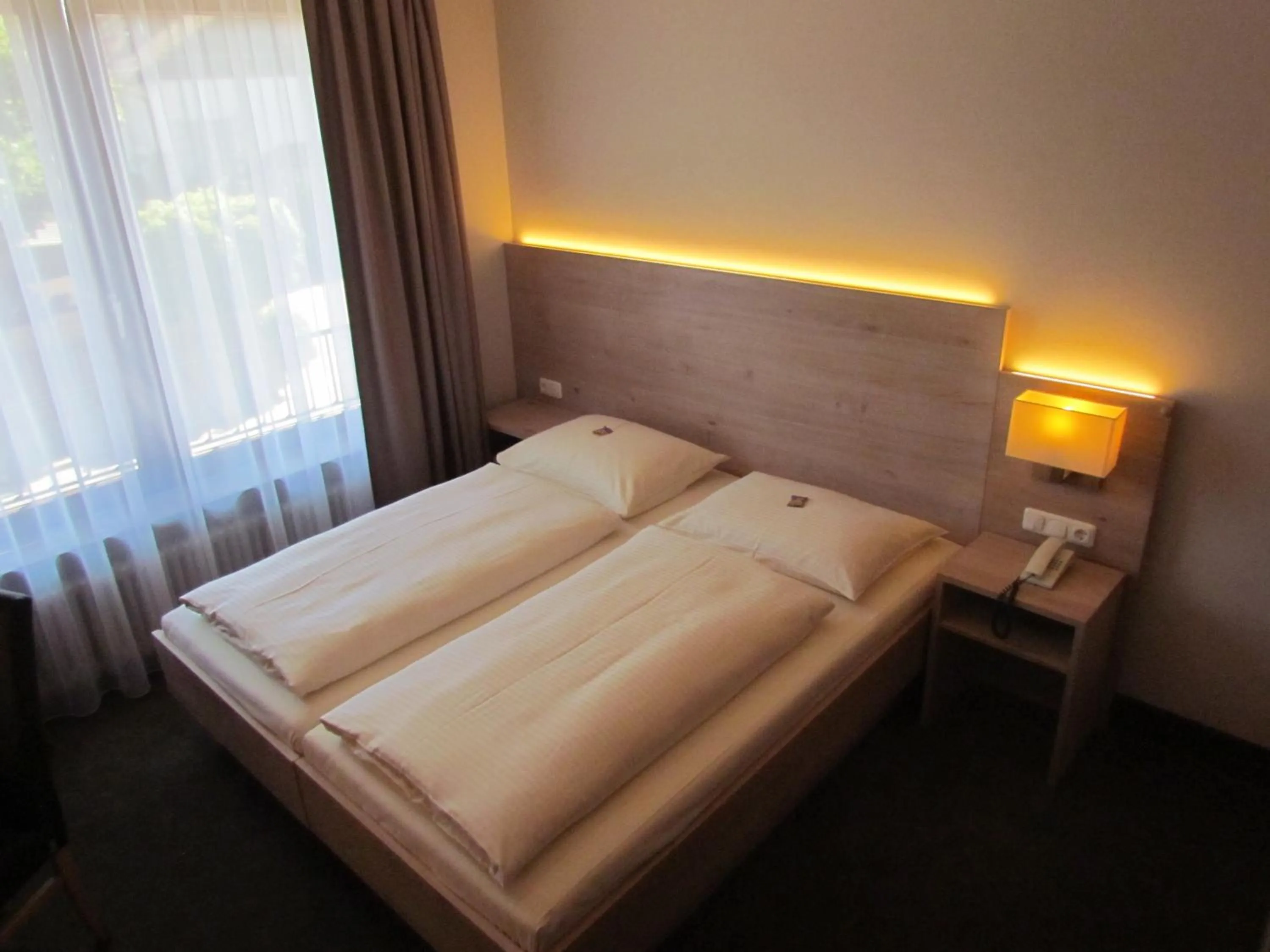 Photo of the whole room, Bed in Hotel Lutter