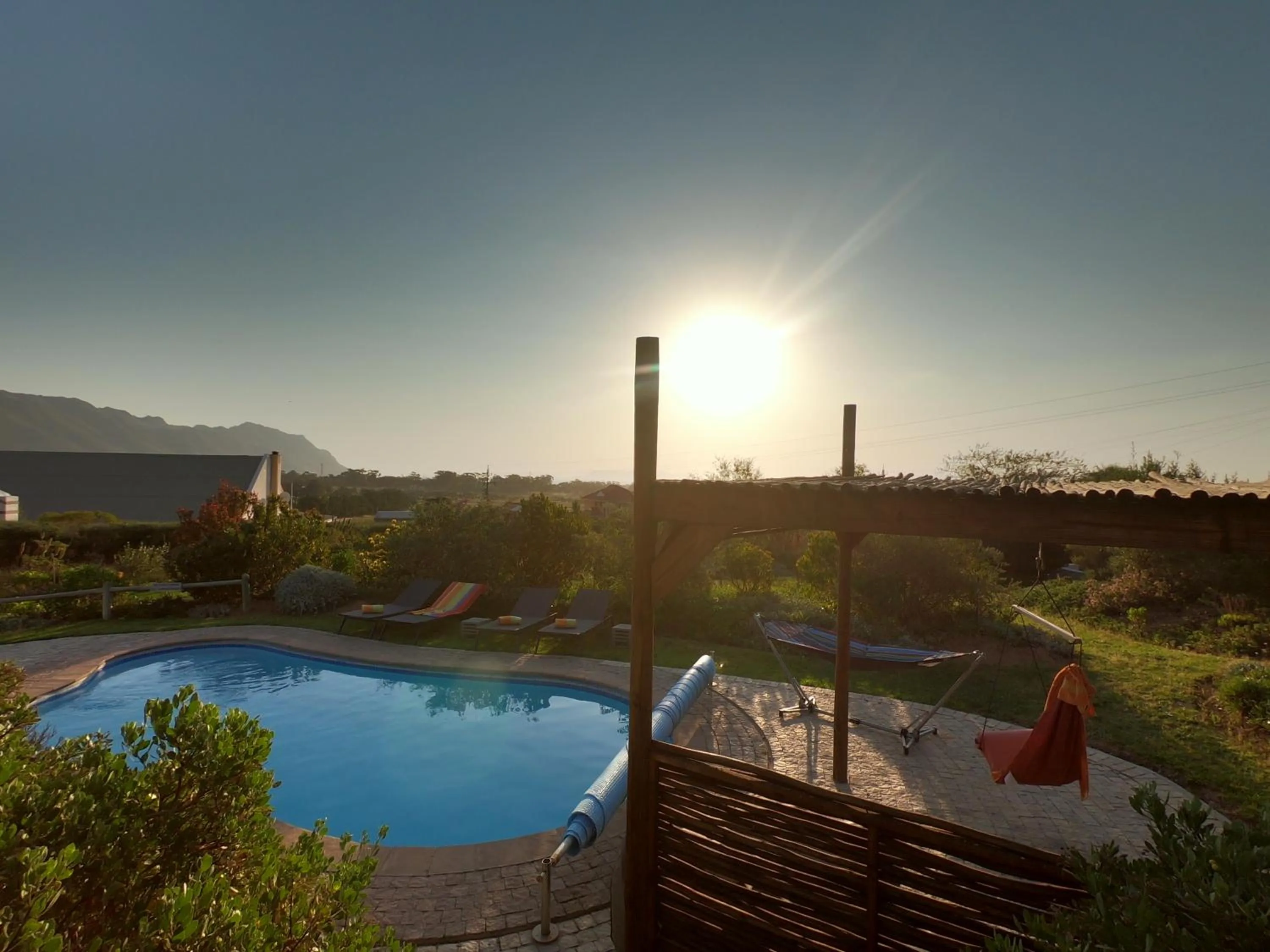 Swimming pool in Wind-Rose Guest House