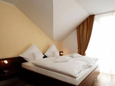 Photo of the whole room, Bed in AKZENT Hotel Altenberge