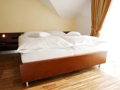 Photo of the whole room, Bed in AKZENT Hotel Altenberge