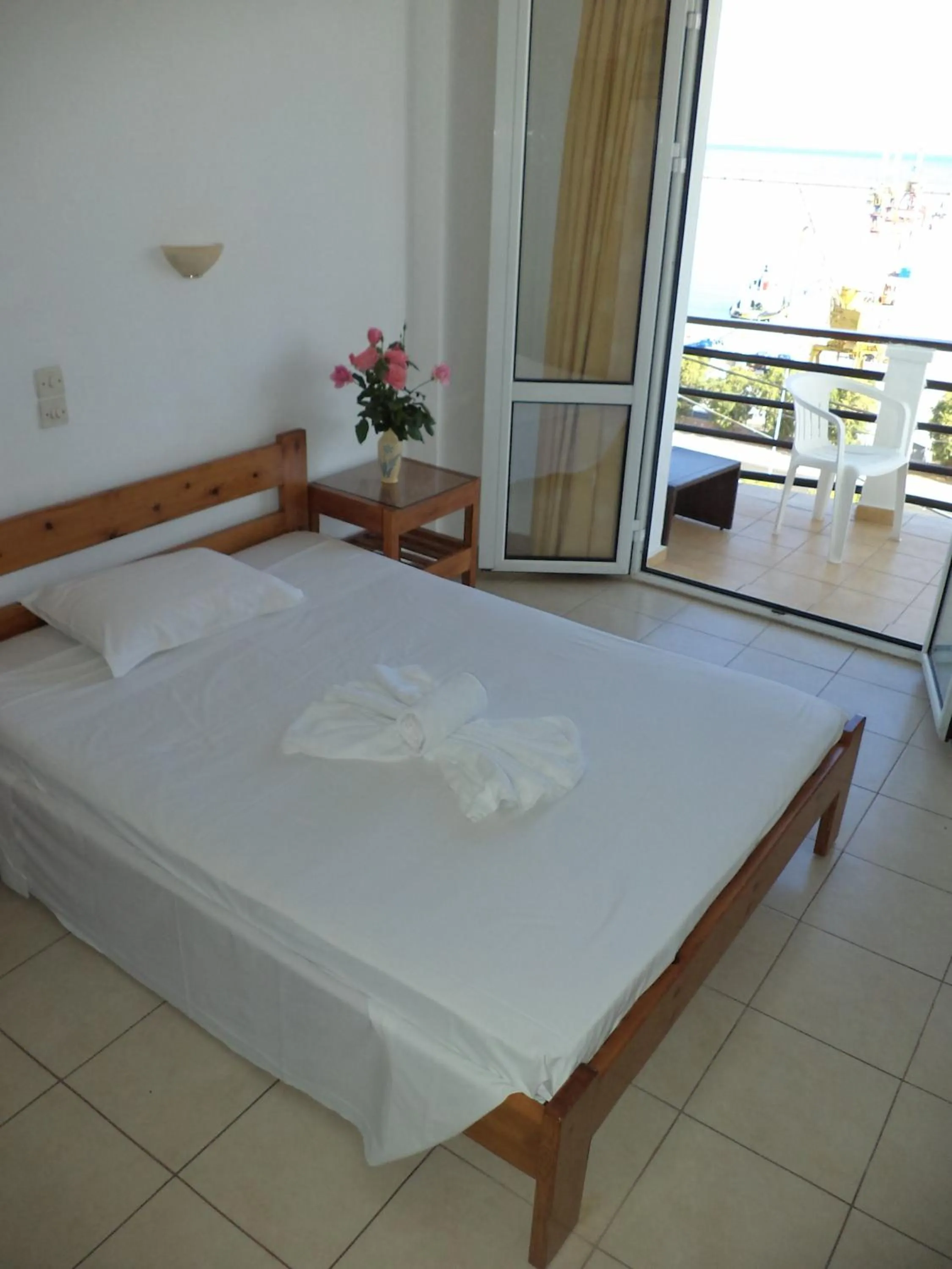 Bed in Poseidon Hotel