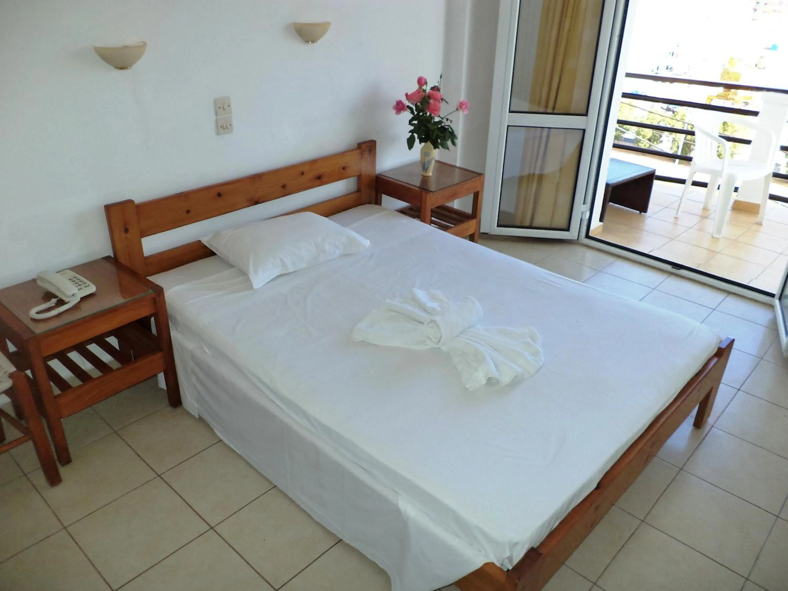 Bed in Poseidon Hotel