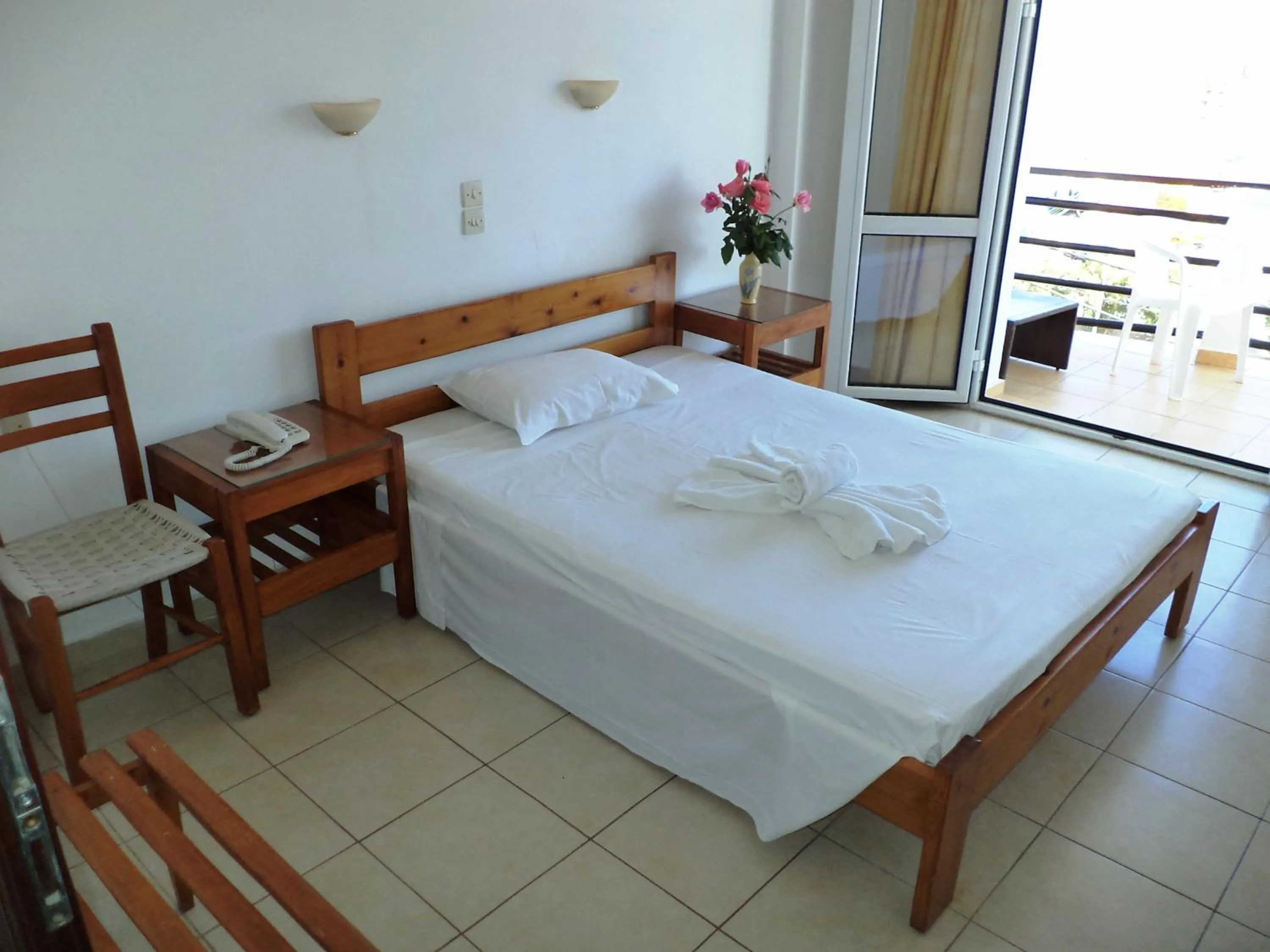 Bed in Poseidon Hotel