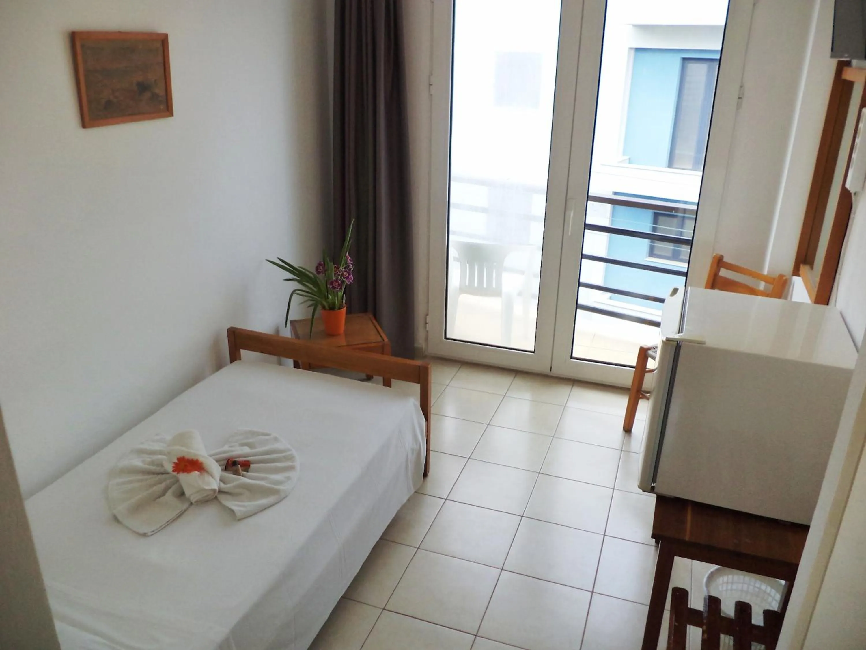 Bed in Poseidon Hotel