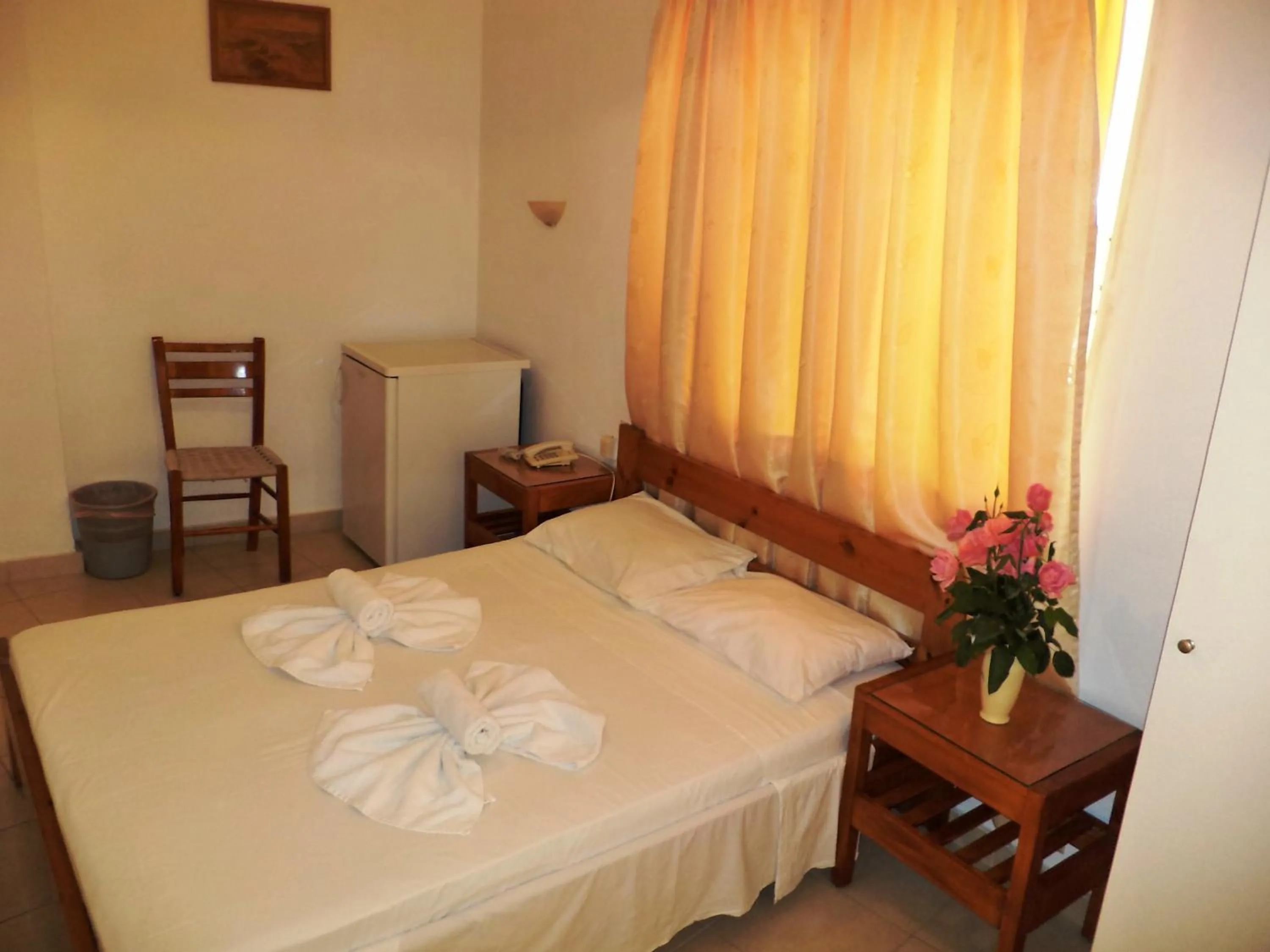 Bed in Poseidon Hotel