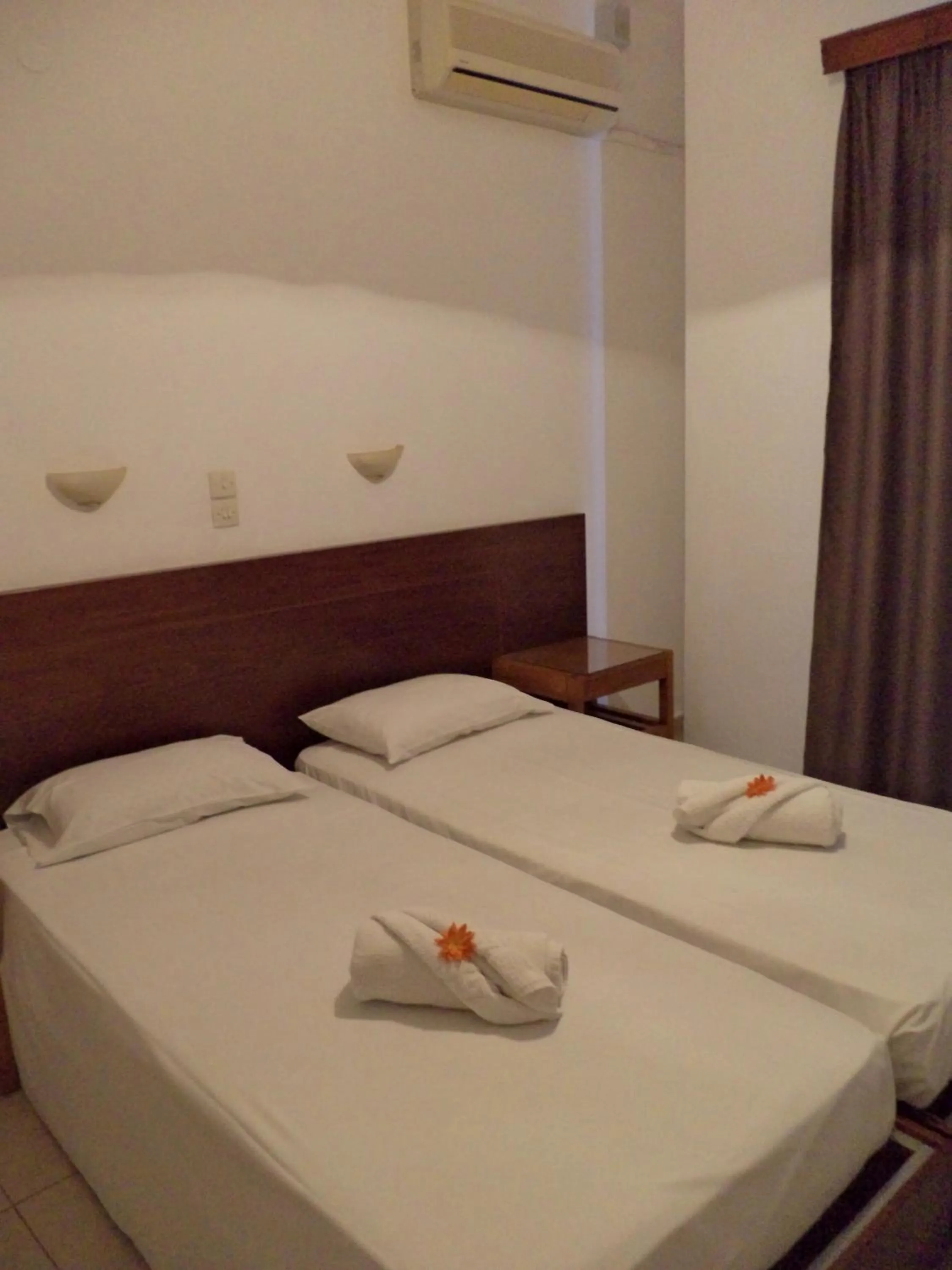 Bed in Poseidon Hotel