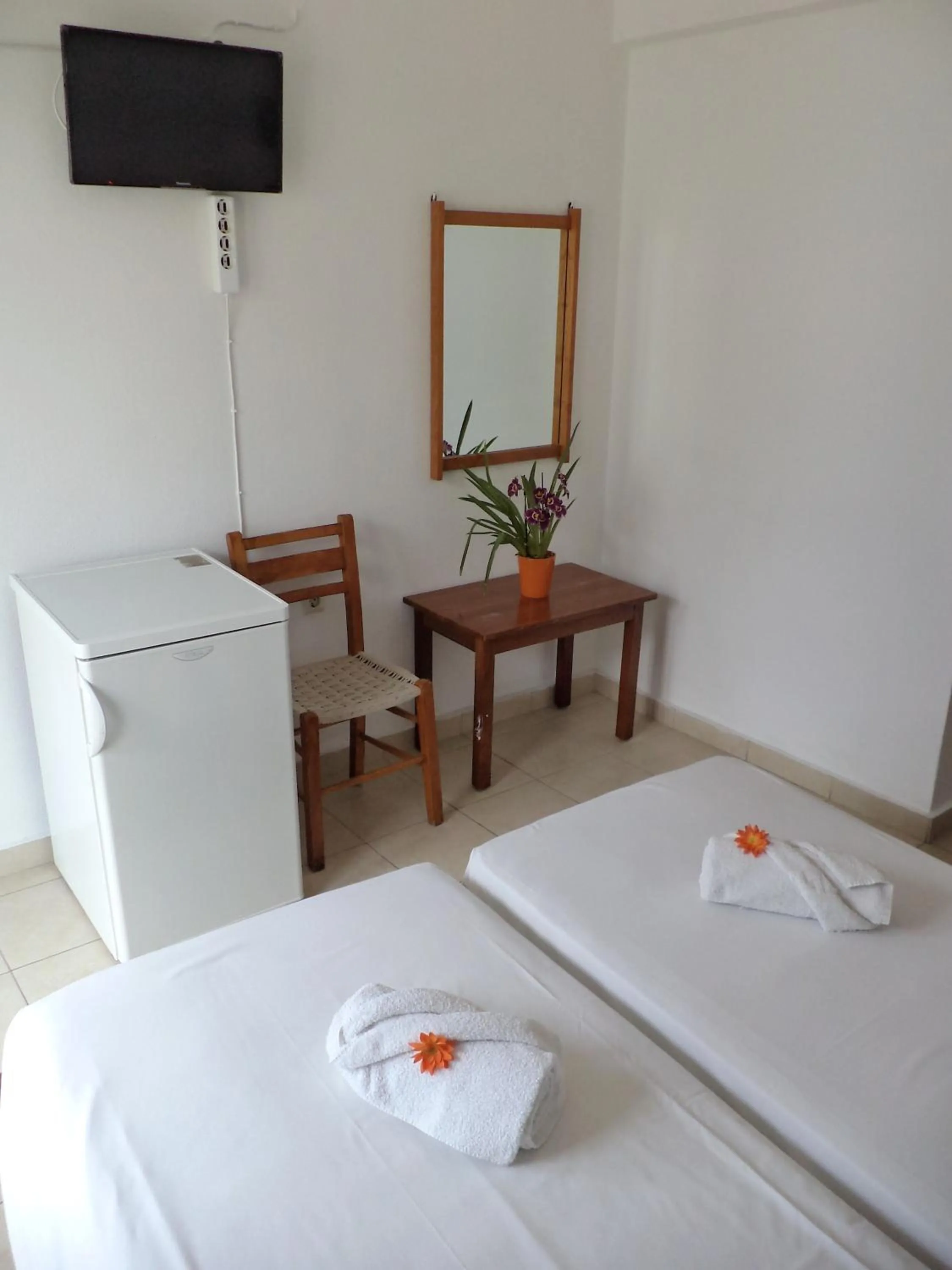 Bed in Poseidon Hotel