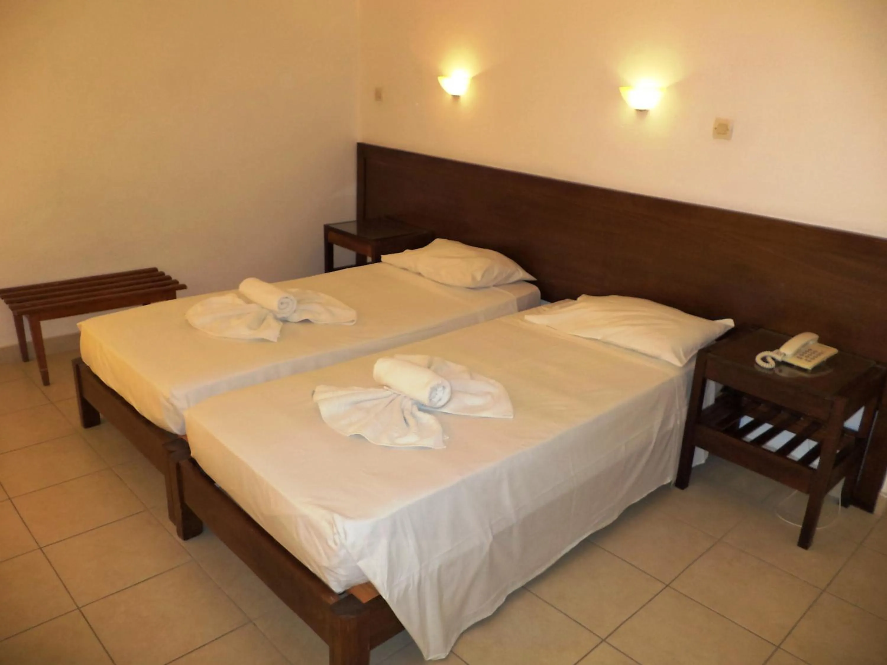 Bed in Poseidon Hotel