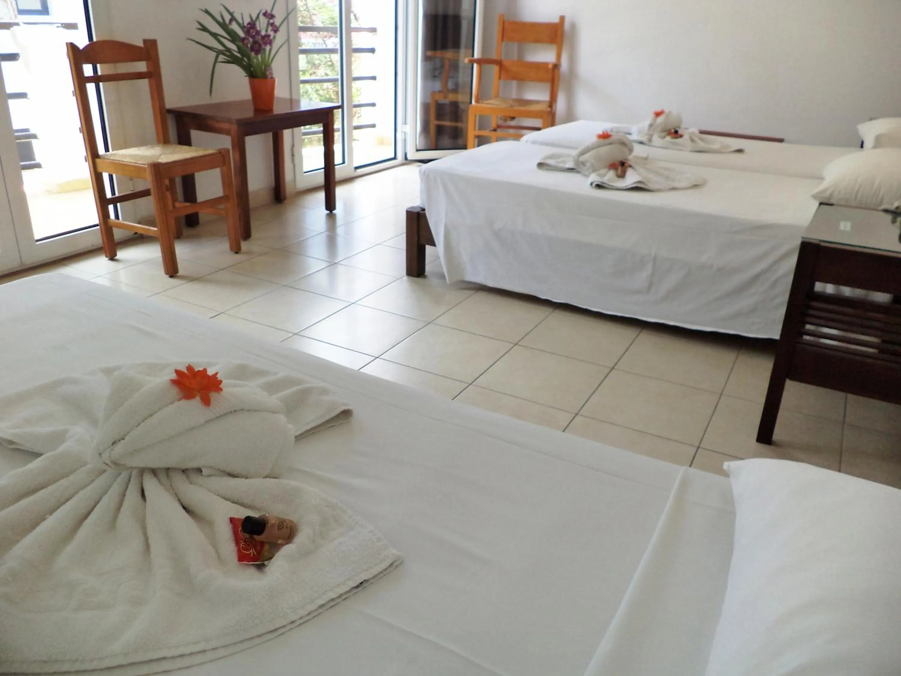 Bed in Poseidon Hotel