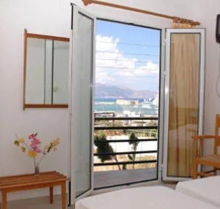 Bed in Poseidon Hotel