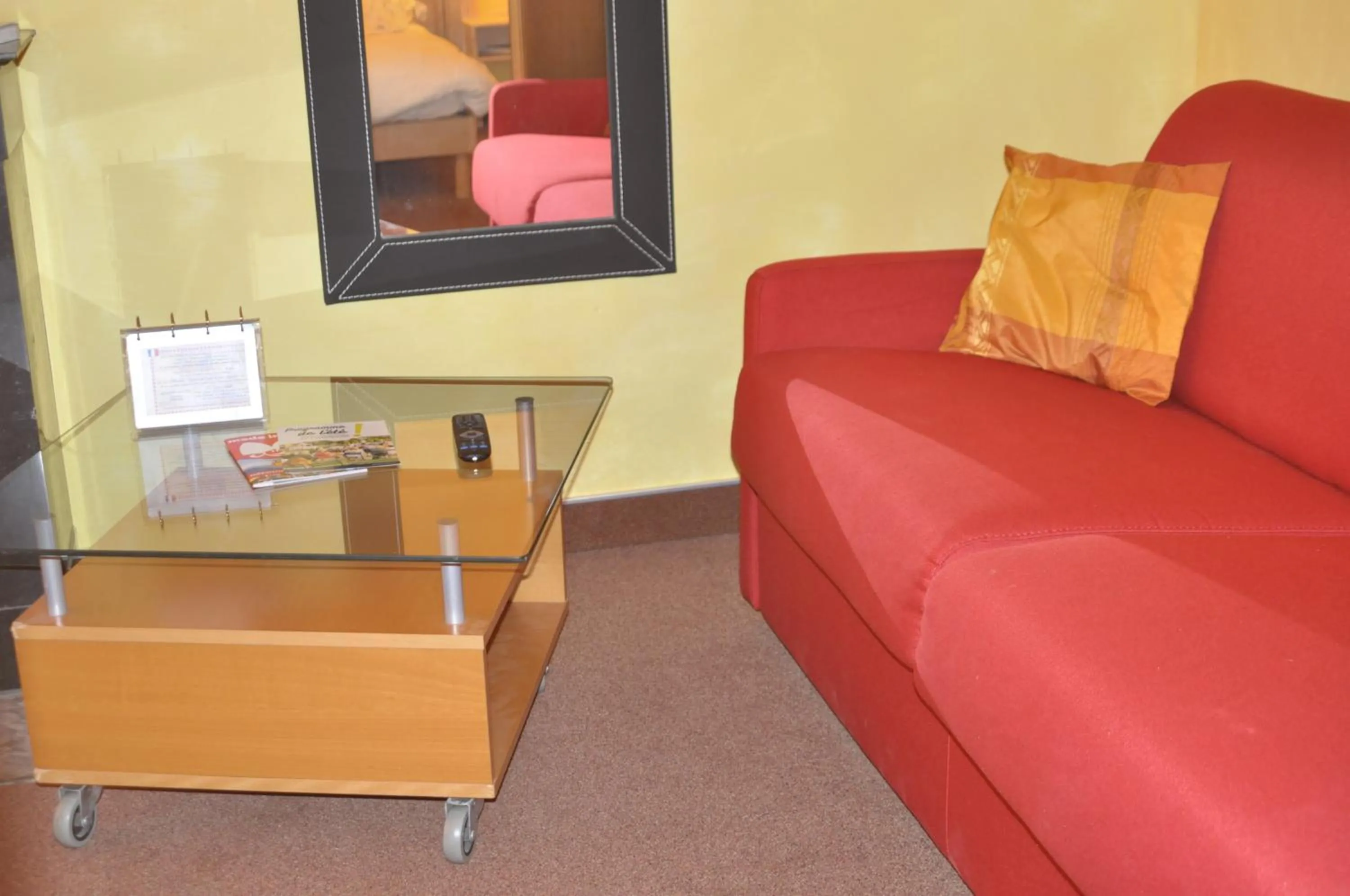 Seating area in Logis Hôtel-Restaurant du Herrenstein