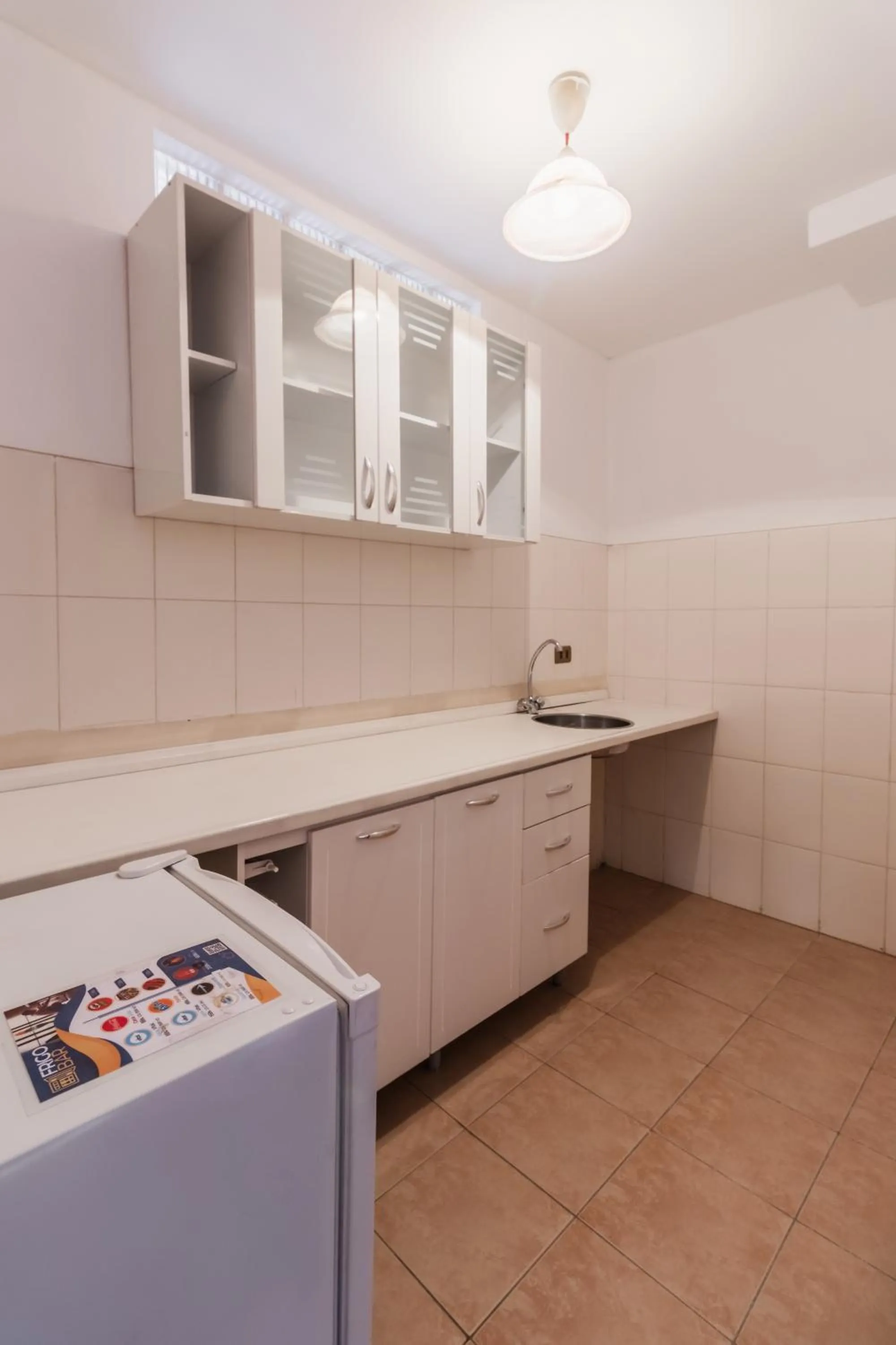 Kitchen or kitchenette in Elegance Hotel