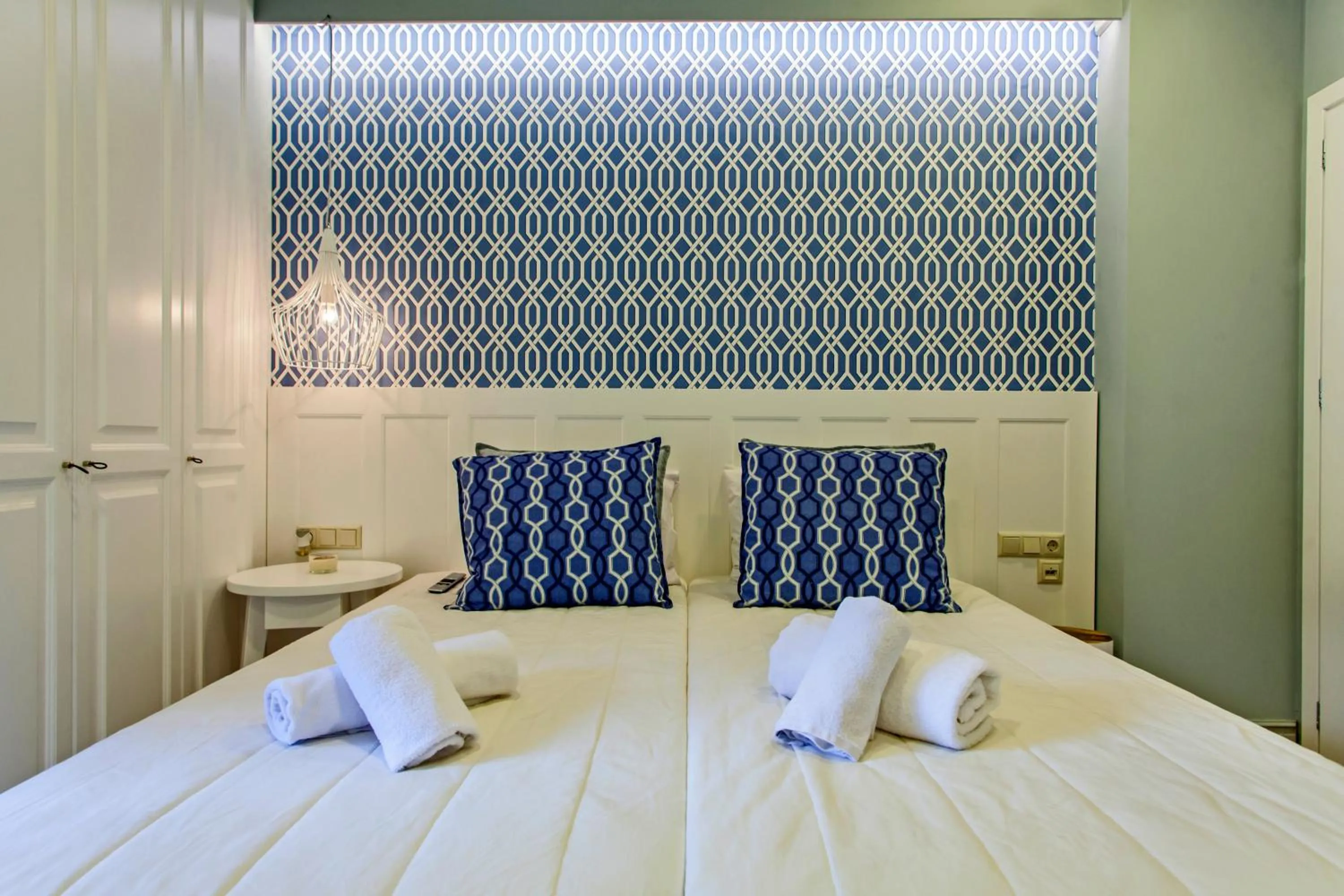 Bed in Candia Studios & Rooms