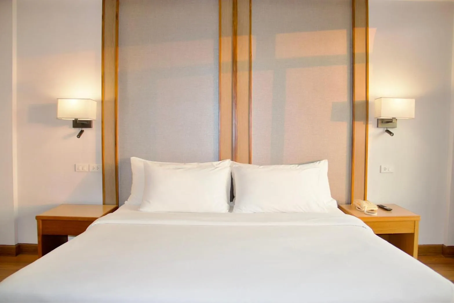 Bed in Golden Beach Hotel Pattaya