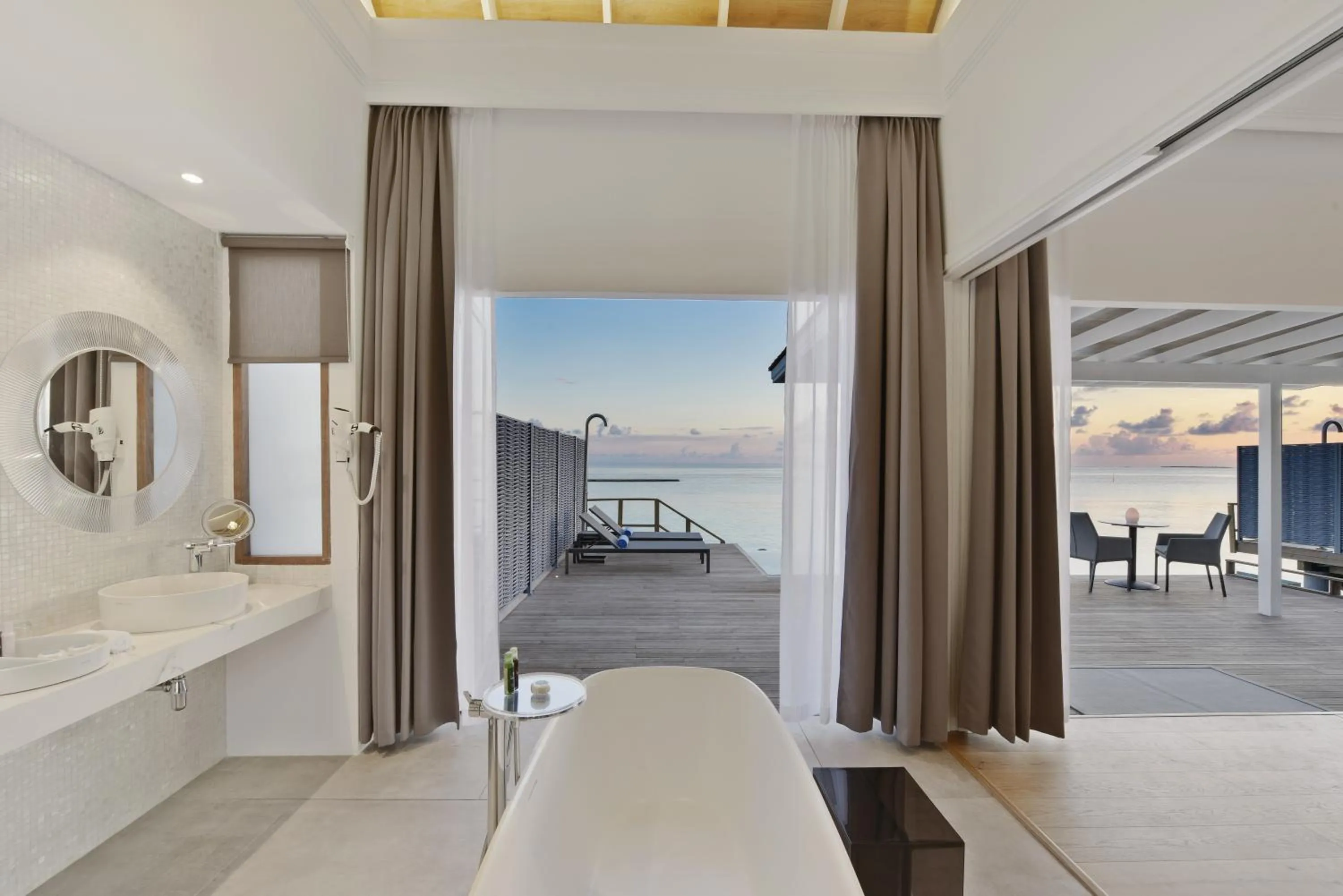 Bathroom, Bed in Kuramathi Maldives