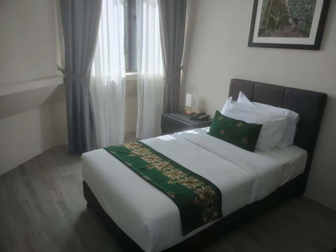 Bed in Telang Usan Hotel Kuching