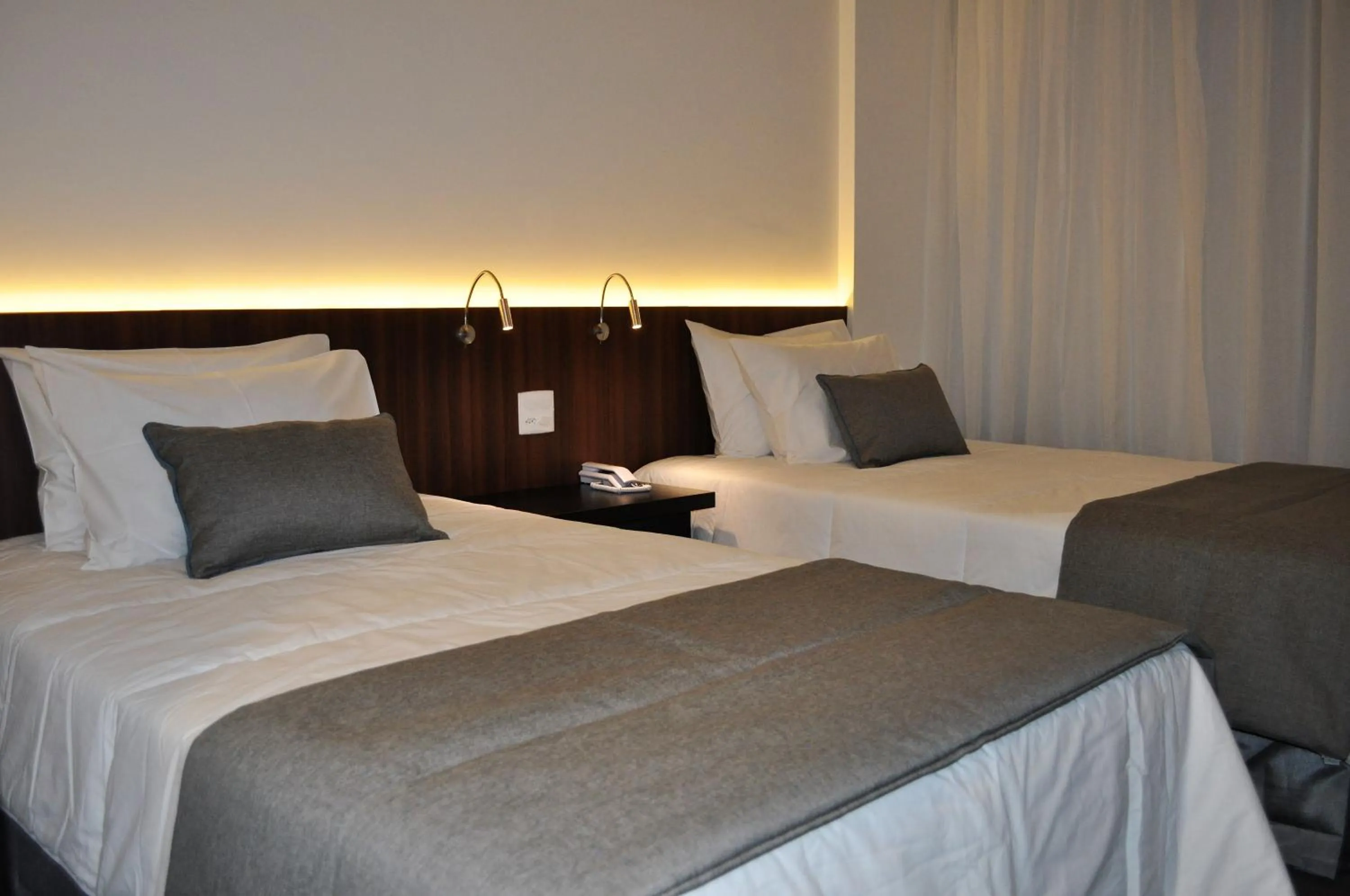 Photo of the whole room, Bed in Wyndham Garden Ribeirão Preto Convention