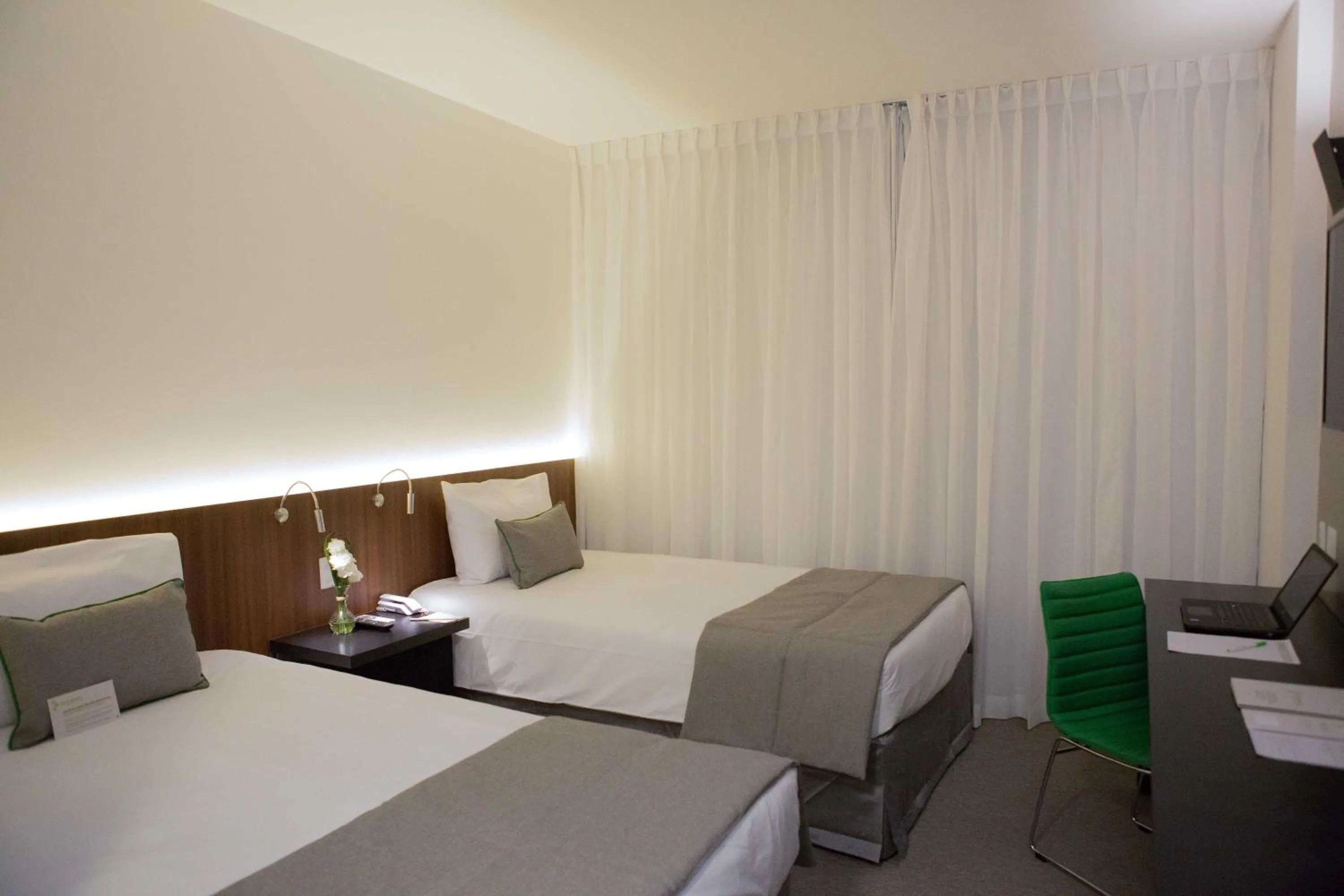 Bed in Wyndham Garden Ribeirão Preto Convention