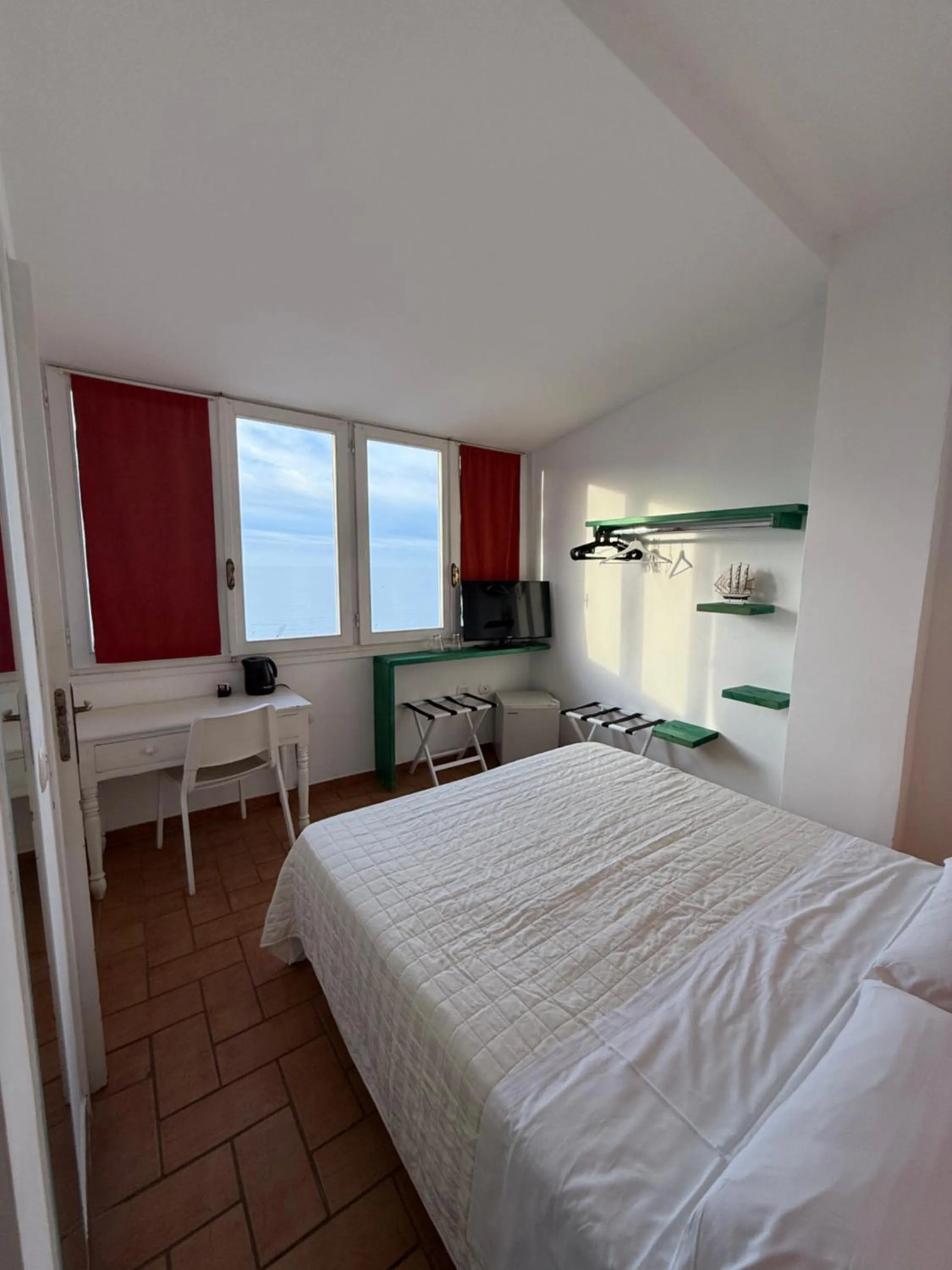 Photo of the whole room, Bed in Tropea Boutique Hotel