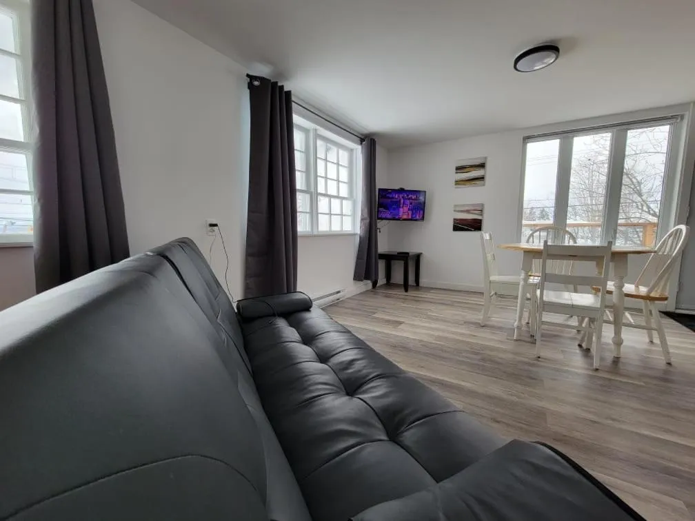 Living room in Aux 4 vents - Auberg'Inn