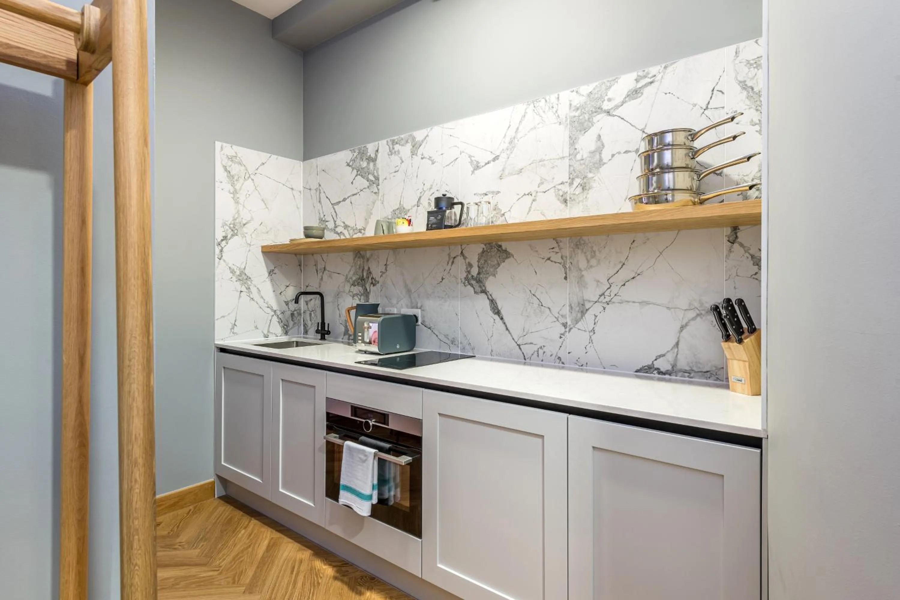 Kitchen or kitchenette in KM Apartments