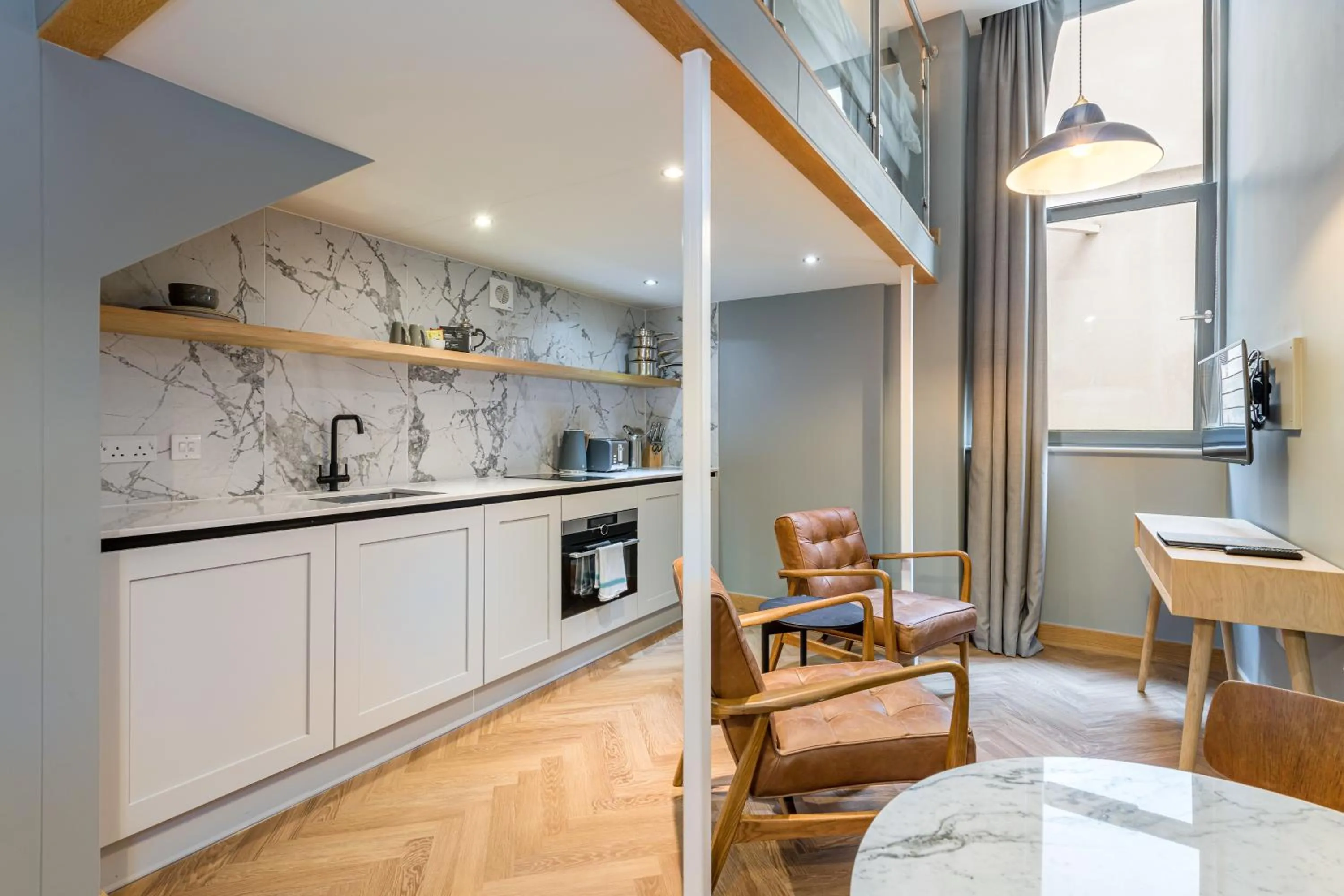 Kitchen or kitchenette in KM Apartments