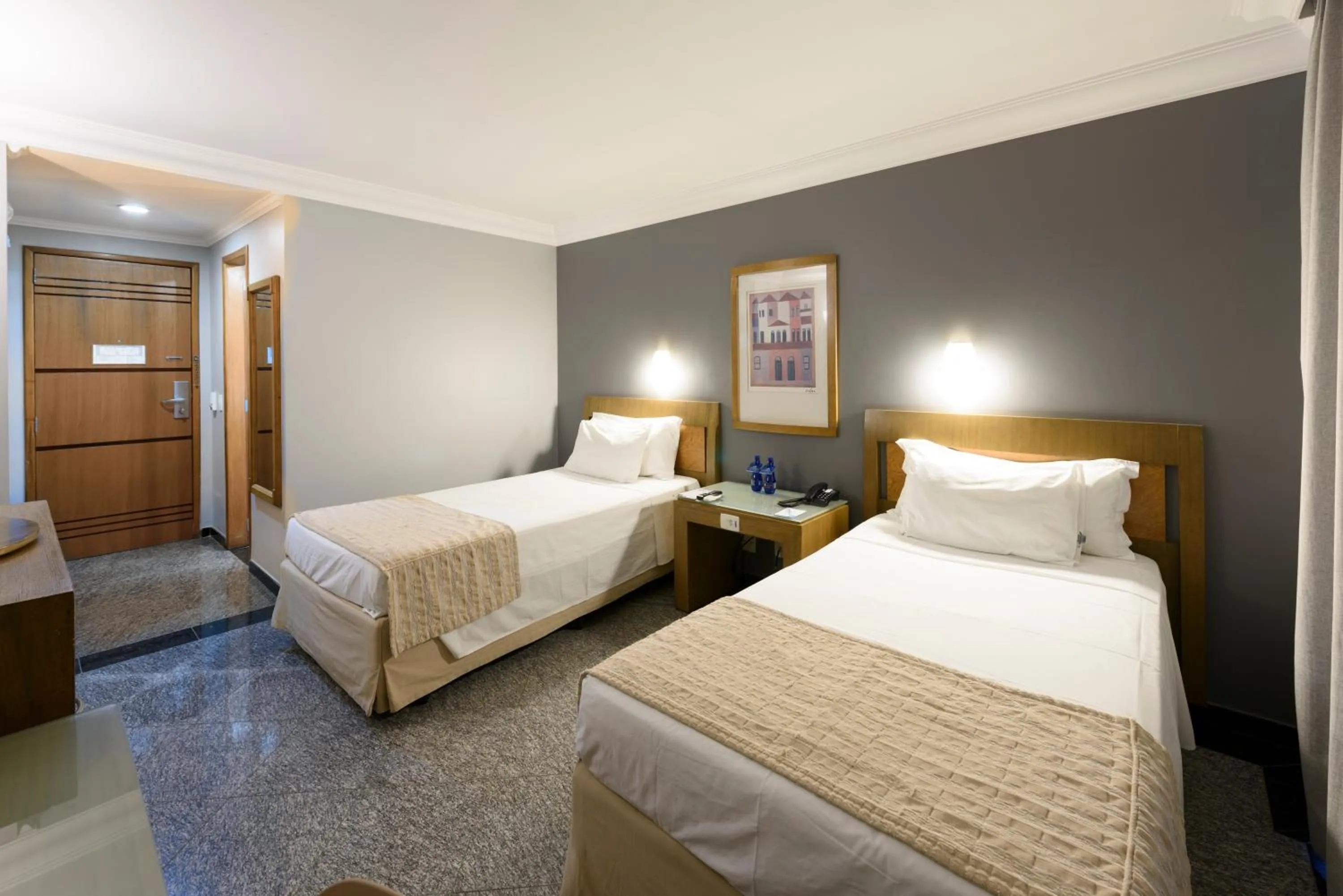 Bed in Plaza Inn Executive