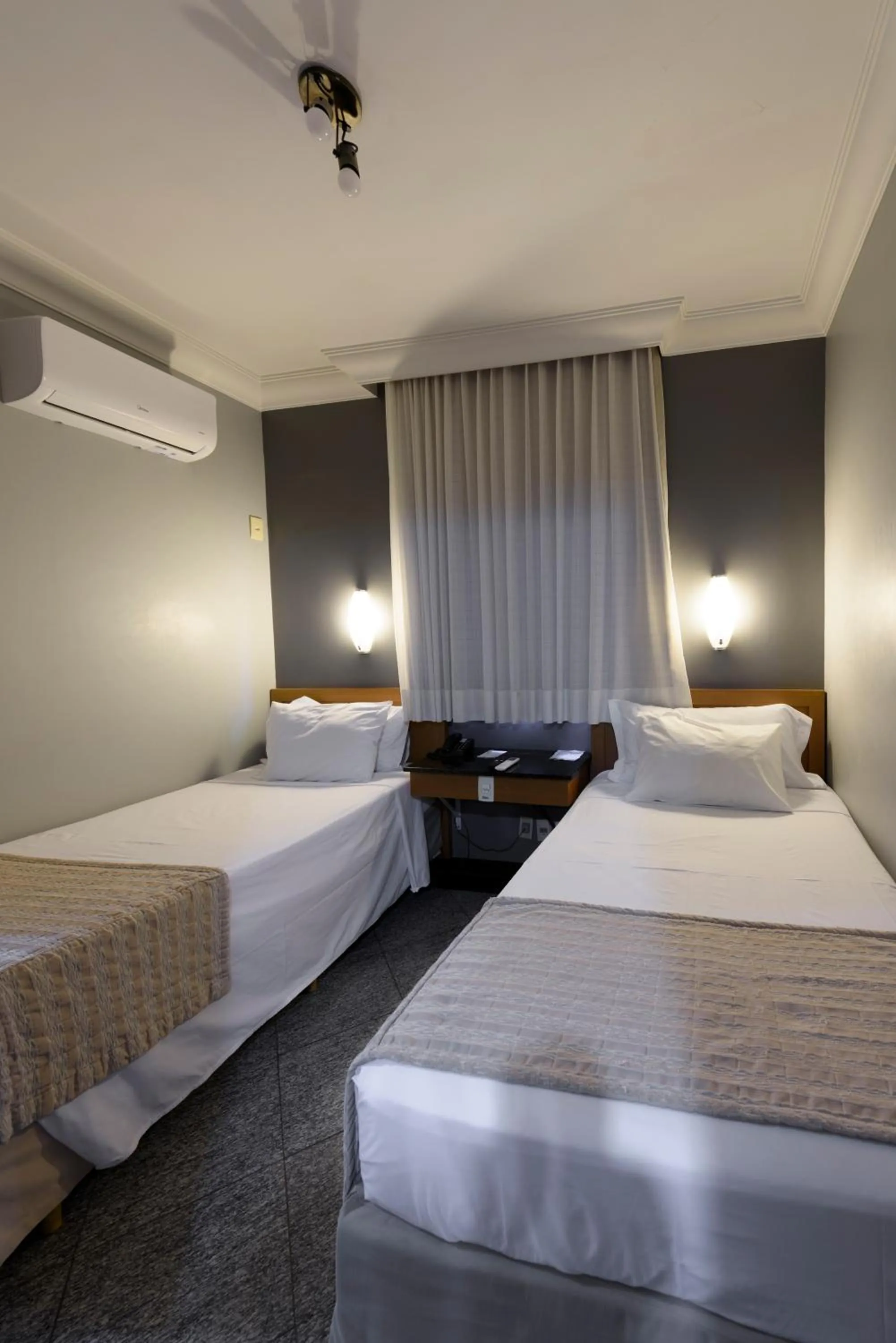 Bed in Plaza Inn Executive