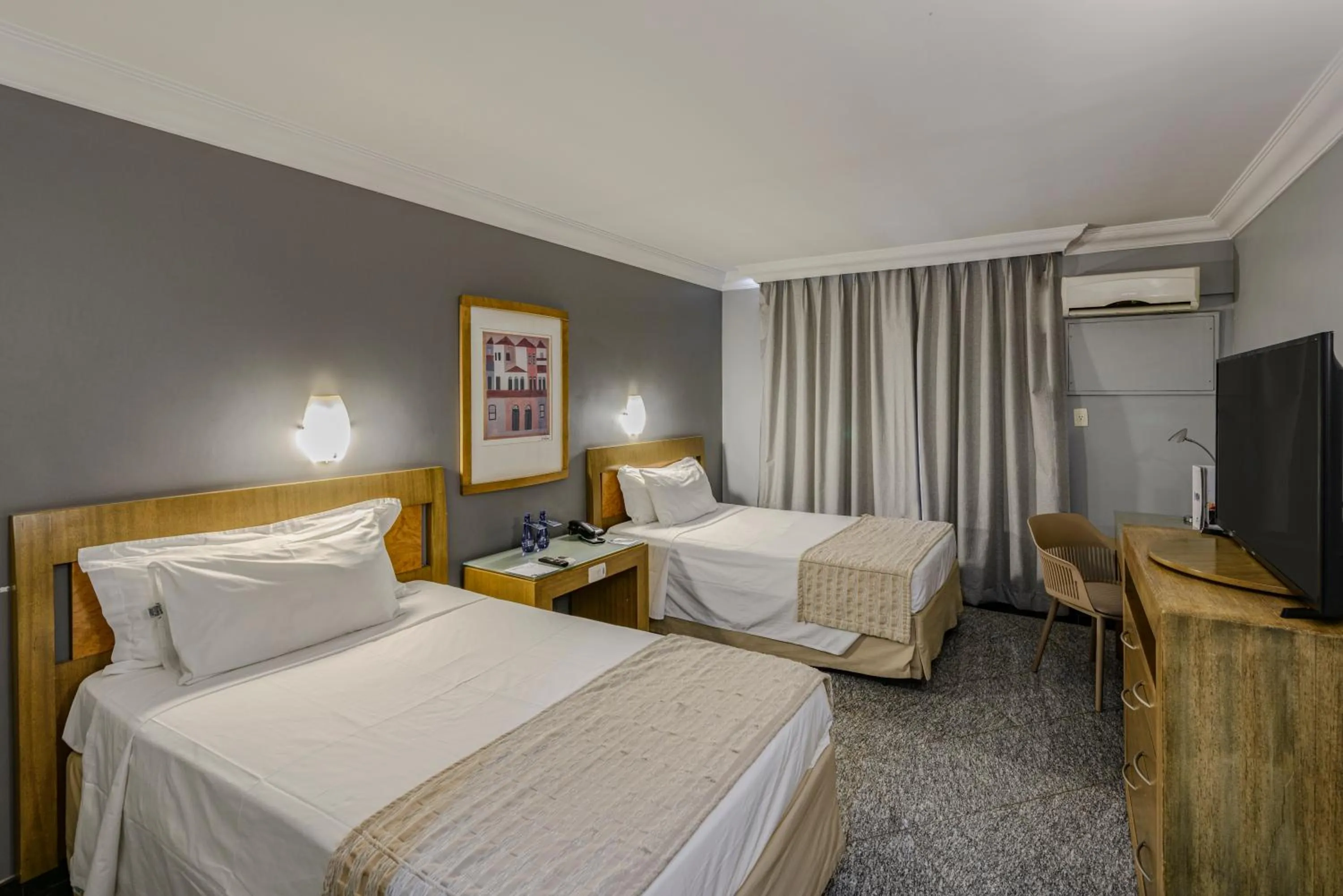 Bed in Plaza Inn Executive